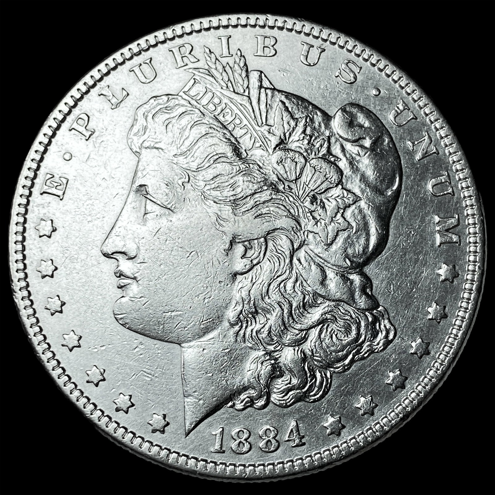 1884 Silver Morgan Dollar CLOSELY UNCIRCULATED (1 of 2)