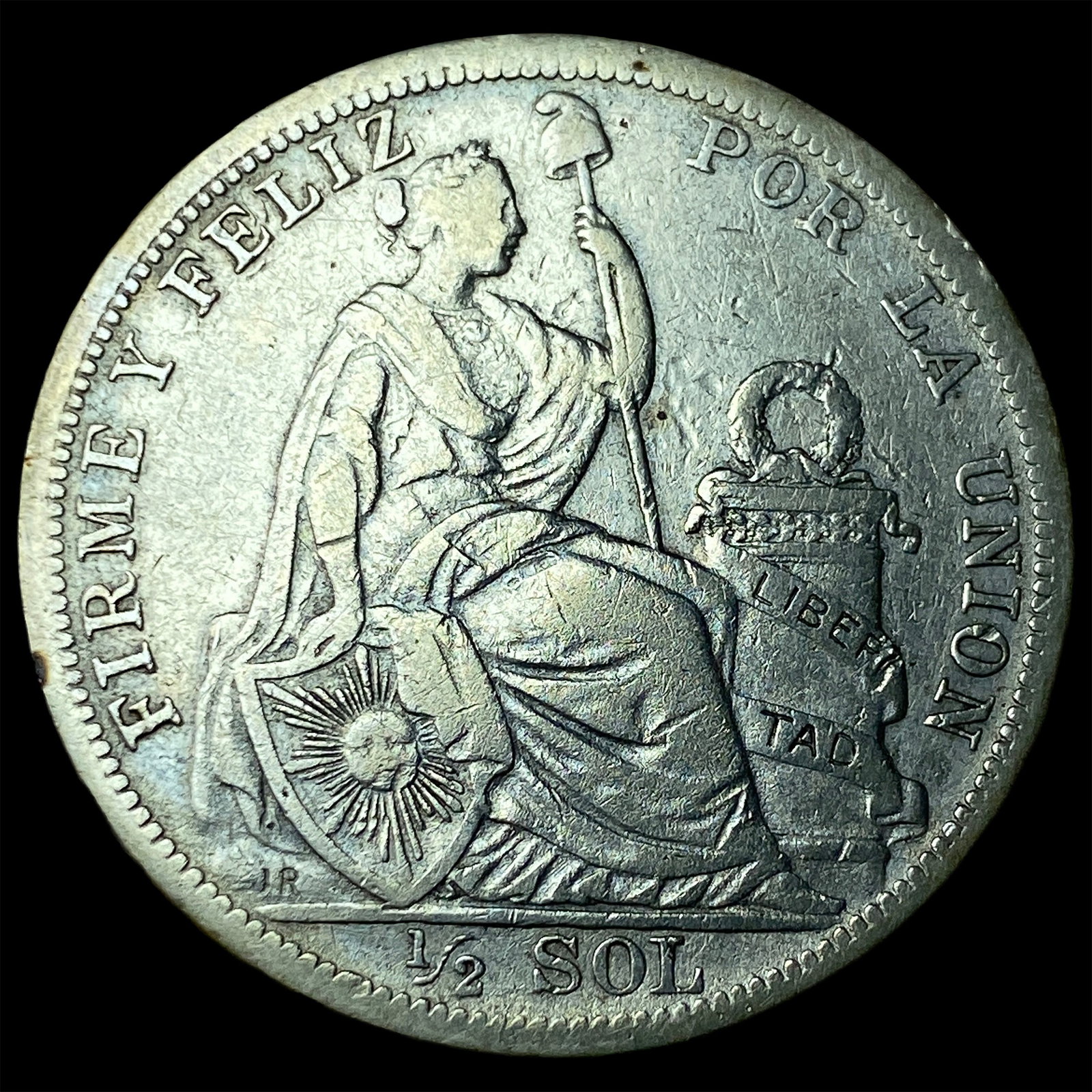 1908 FC JR Peru Silver 1/2 Sol (1 of 2)