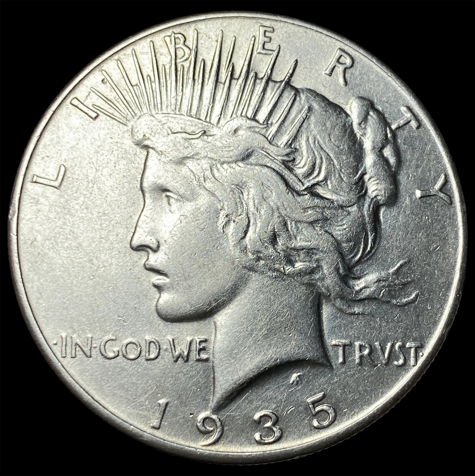 1935 Peace Silver Dollar NEARLY UNCIRCULATED (1 of 2)