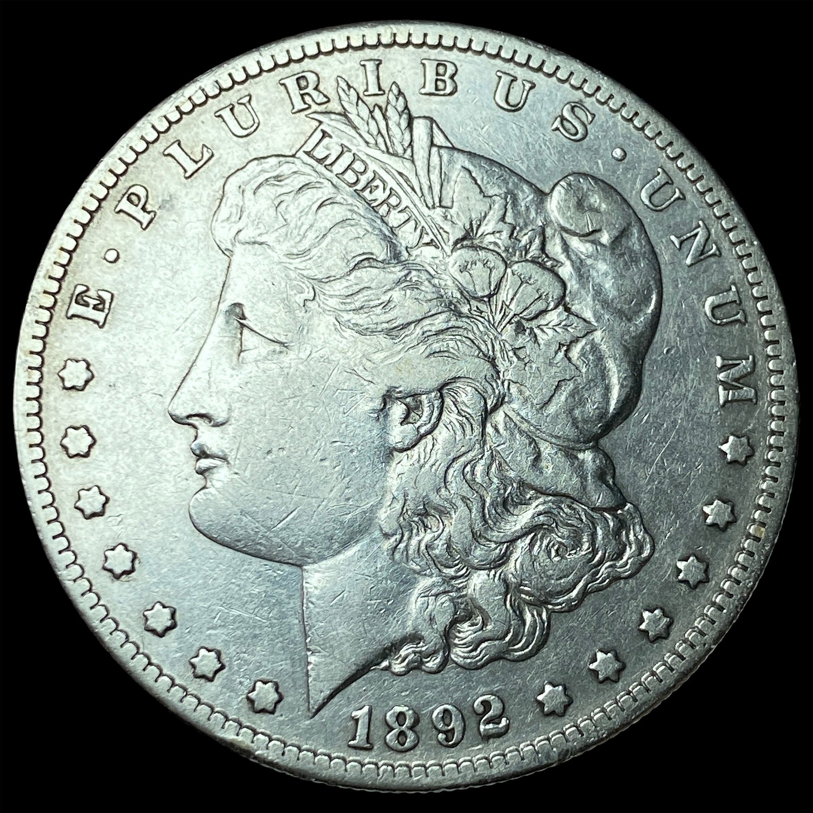 1892-S Silver Morgan Dollar ABOUT UNCIRCULATED: 1892-S Silver Morgan Dollar ABOUT UNCIRCULATED