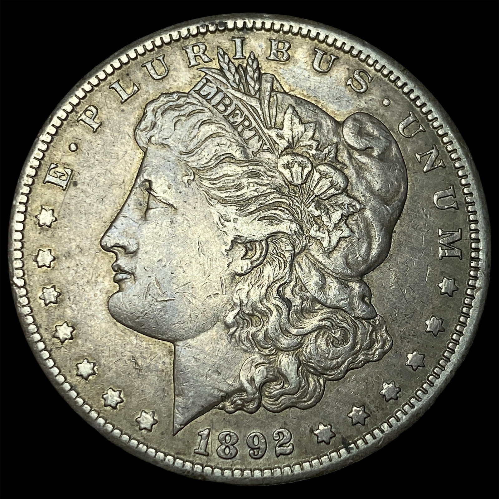 1892-CC Silver Morgan Dollar NEARLY UNCIRCULATED: 1892-CC Silver Morgan Dollar NEARLY UNCIRCULATED