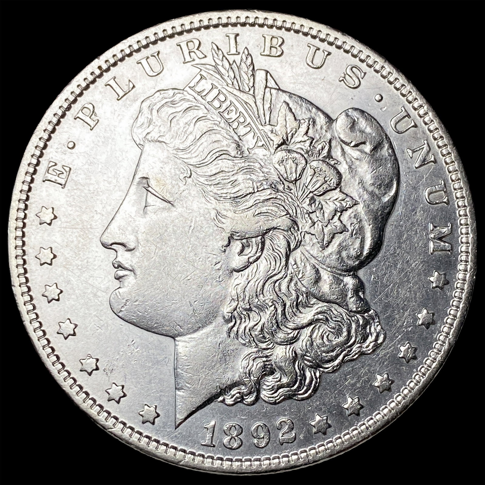 1892 Silver Morgan Dollar CLOSELY UNCIRCULATED (1 of 2)