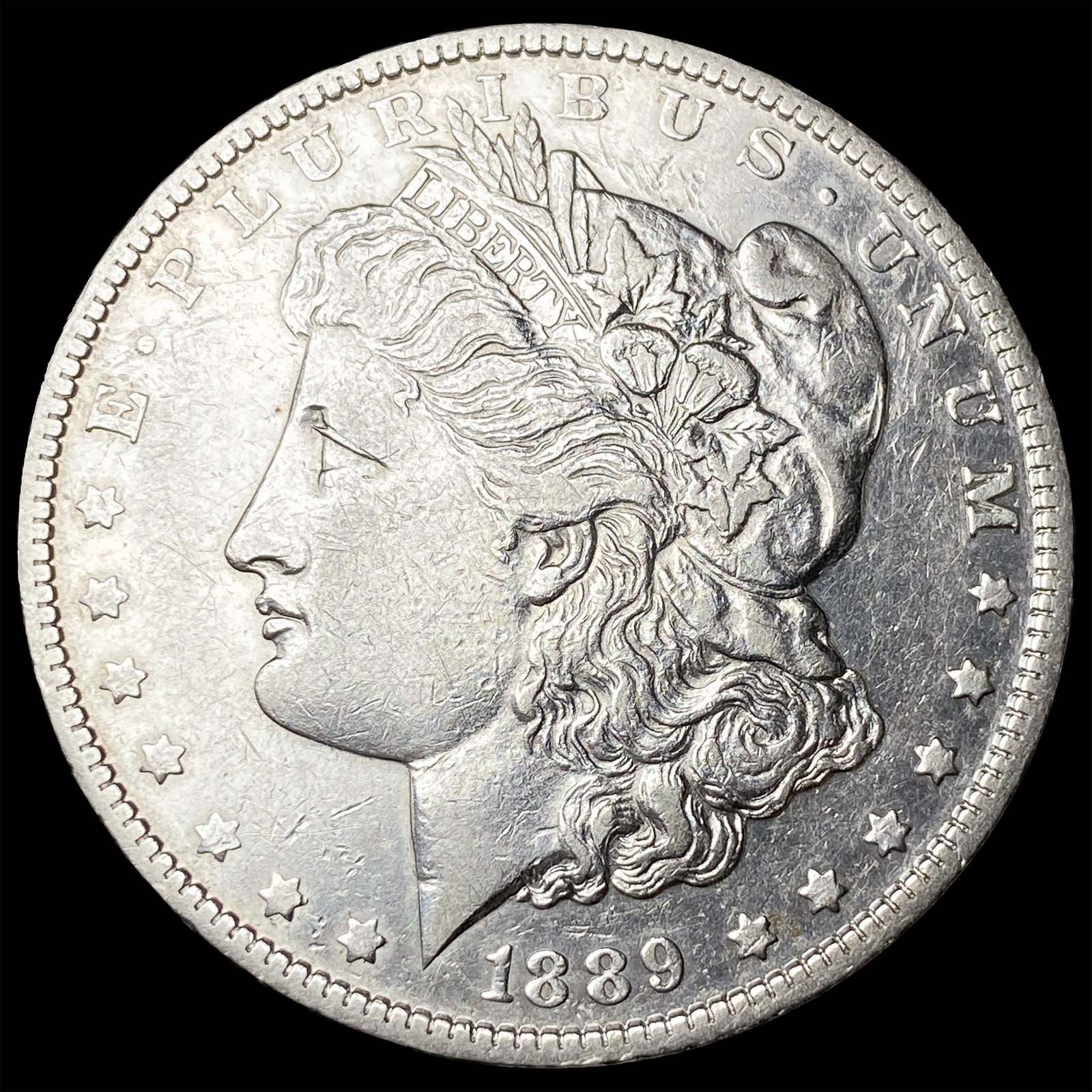 1889-O Silver Morgan Dollar CLOSELY UNCIRCULATED (1 of 2)