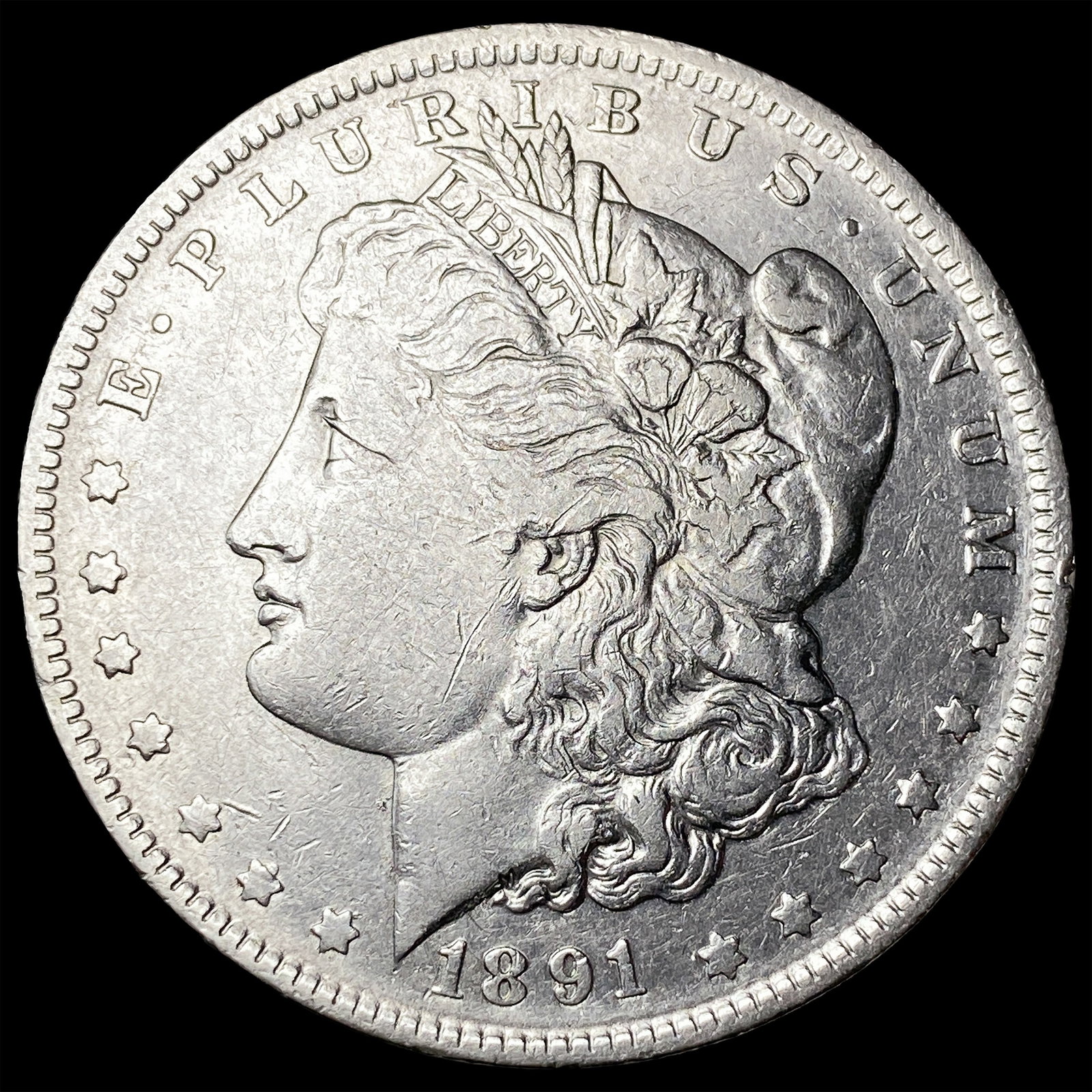 1891-O Silver Morgan Dollar NEARLY UNCIRCULATED (1 of 2)