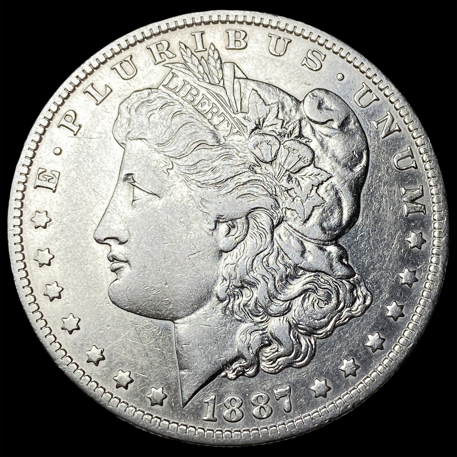 1887-O Silver Morgan Dollar CLOSELY UNCIRCULATED (1 of 2)
