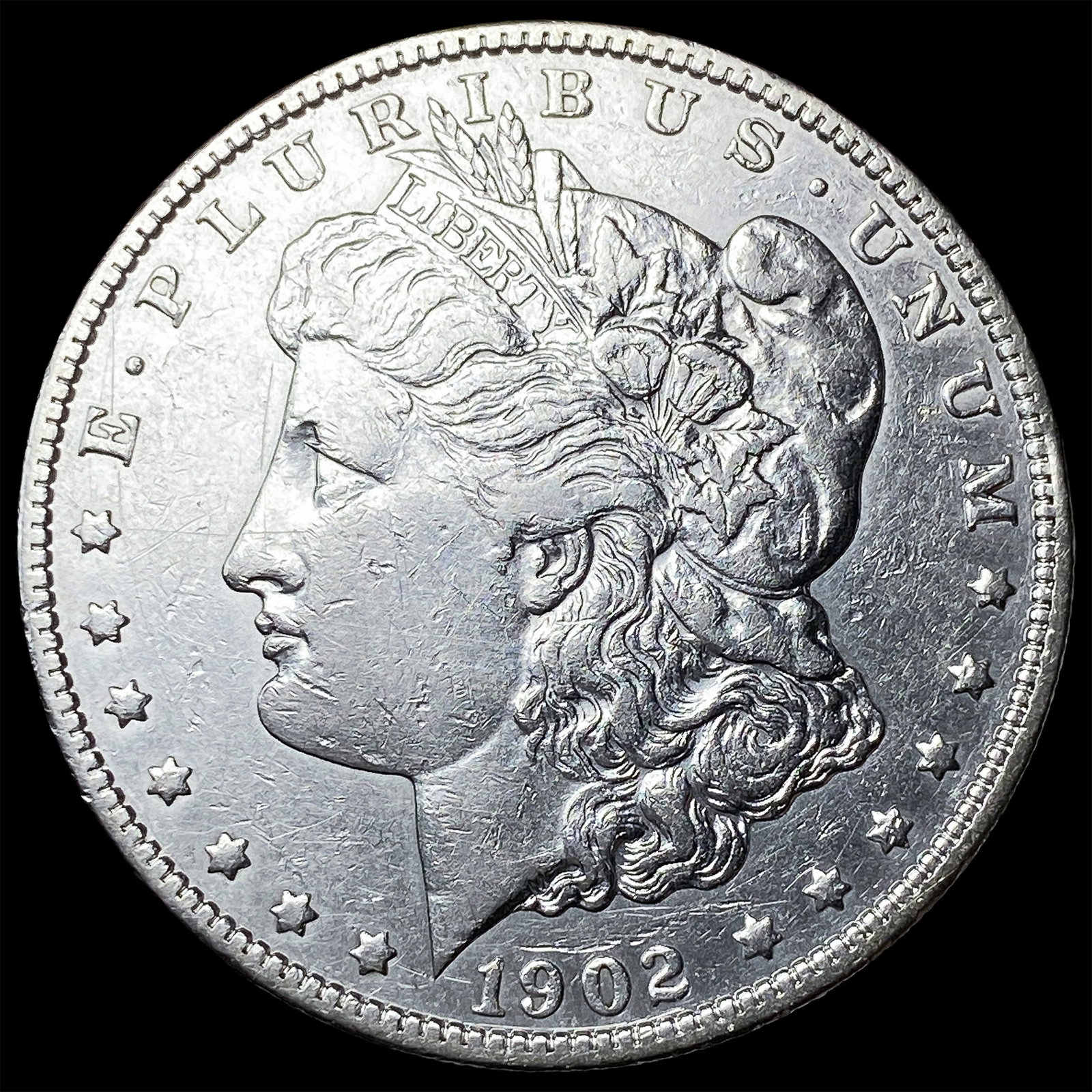 1902 Silver Morgan Dollar NEARLY UNCIRCULATED (1 of 2)