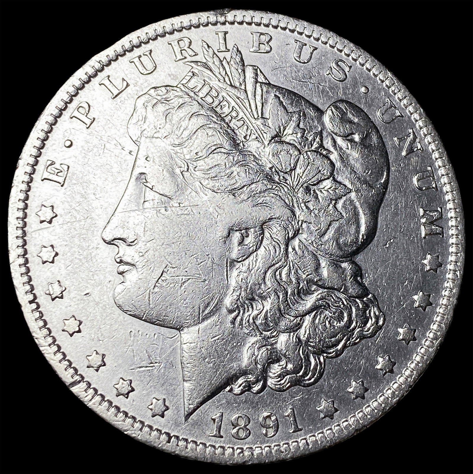 1891-O Silver Morgan Dollar CLOSELY UNCIRCULATED (1 of 2)