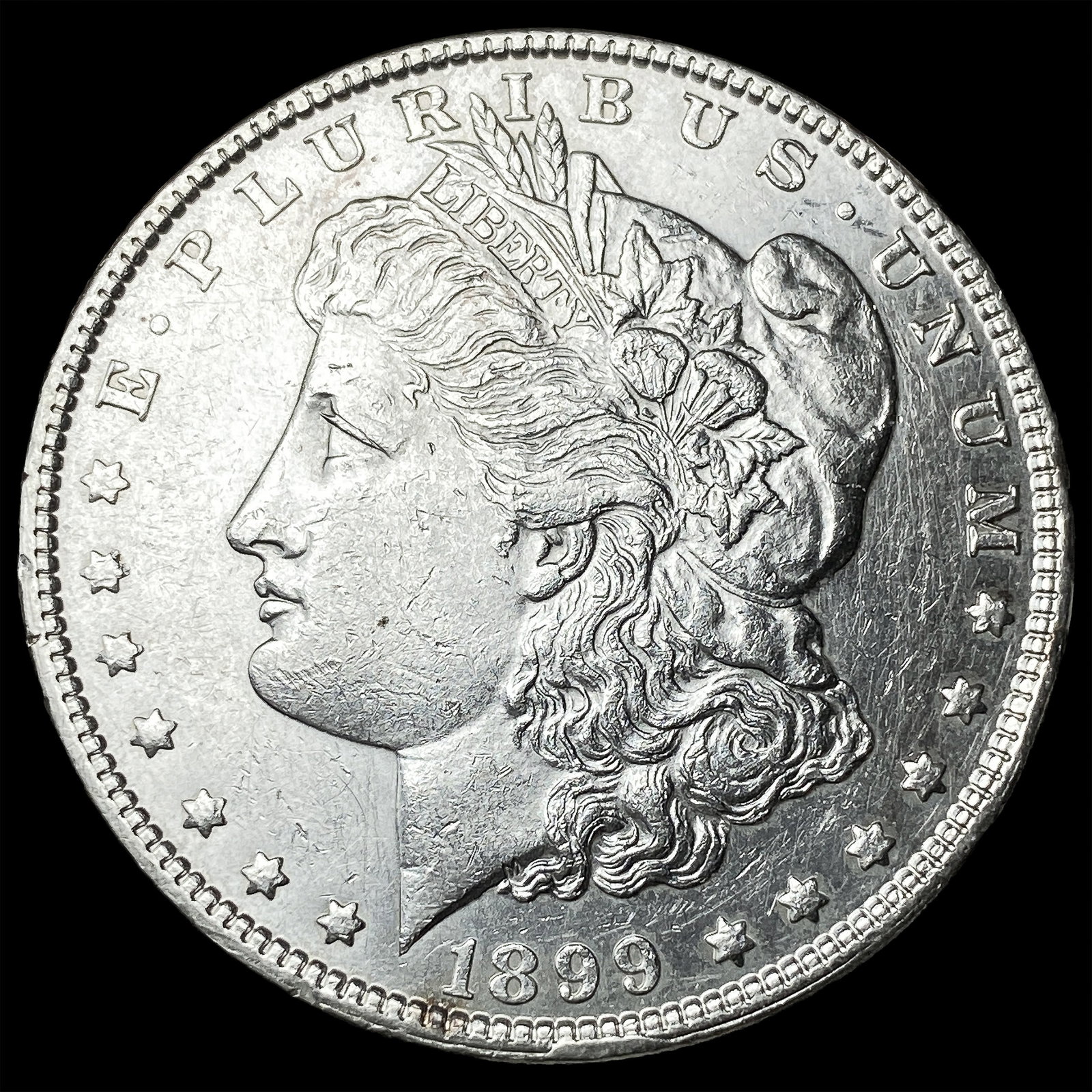 1899 Silver Morgan Dollar CLOSELY UNCIRCULATED: 1899 Silver Morgan Dollar CLOSELY UNCIRCULATED