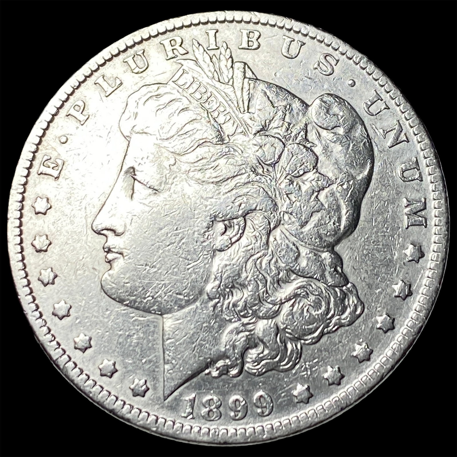 1899 Morgan Silver Dollar NEARLY UNCIRCULATED (1 of 2)