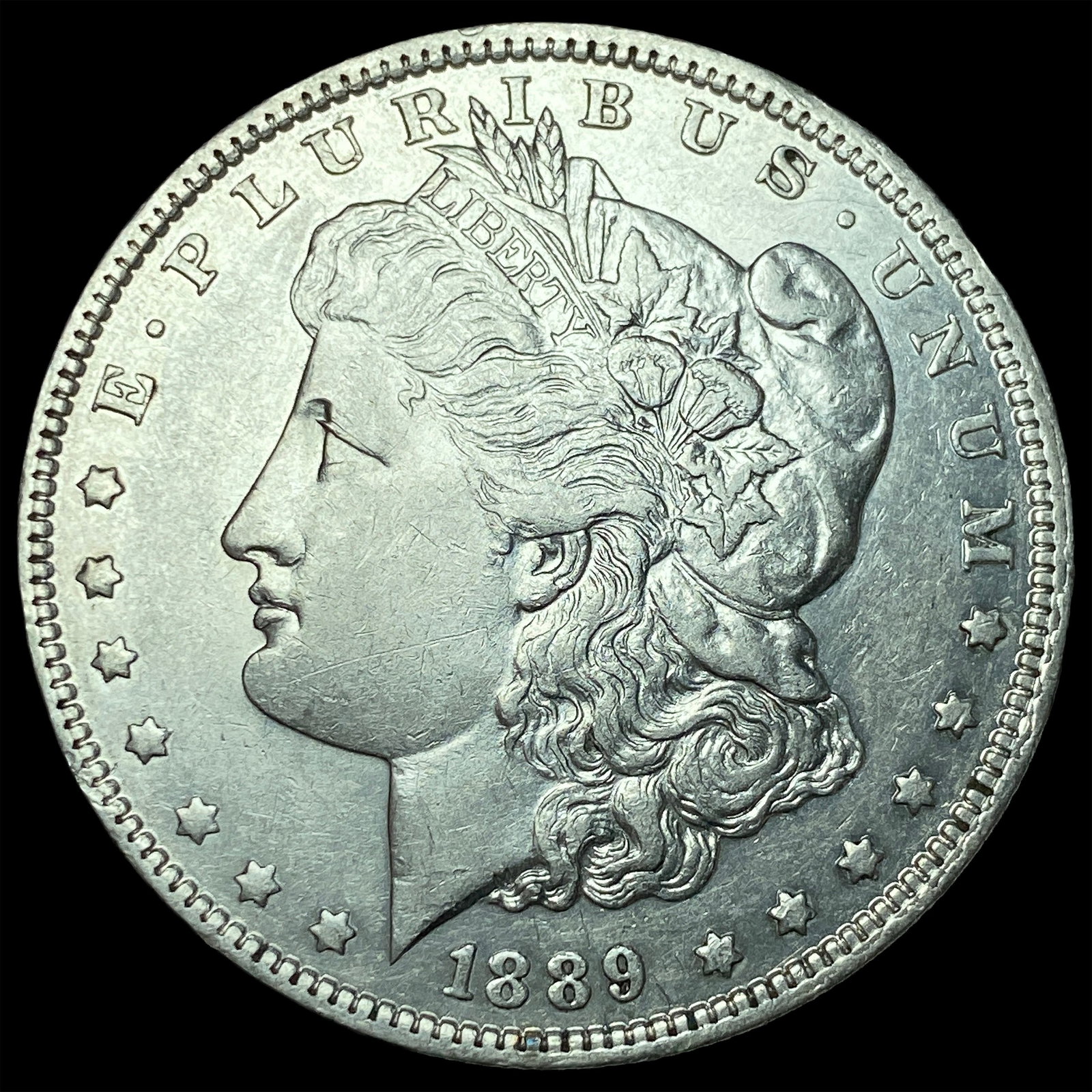 1889-O Silver Morgan Dollar CLOSELY UNCIRCULATED (1 of 2)