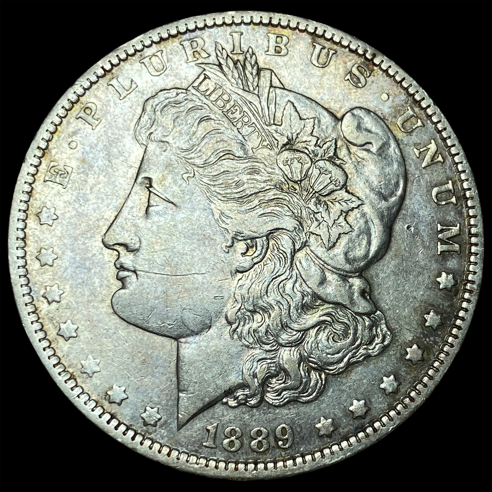 1889-O Silver Morgan Dollar NEARLY UNCIRCULATED (1 of 2)