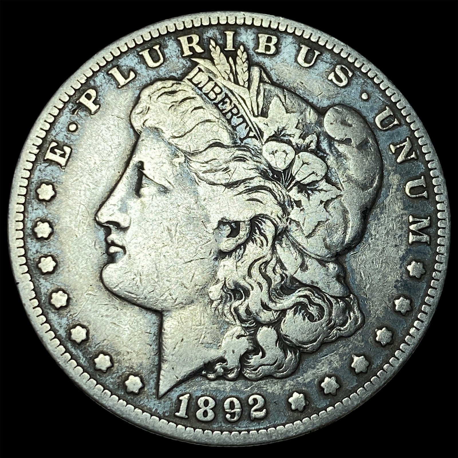1892-S Silver Morgan Dollar NEARLY UNCIRCULATED (1 of 2)