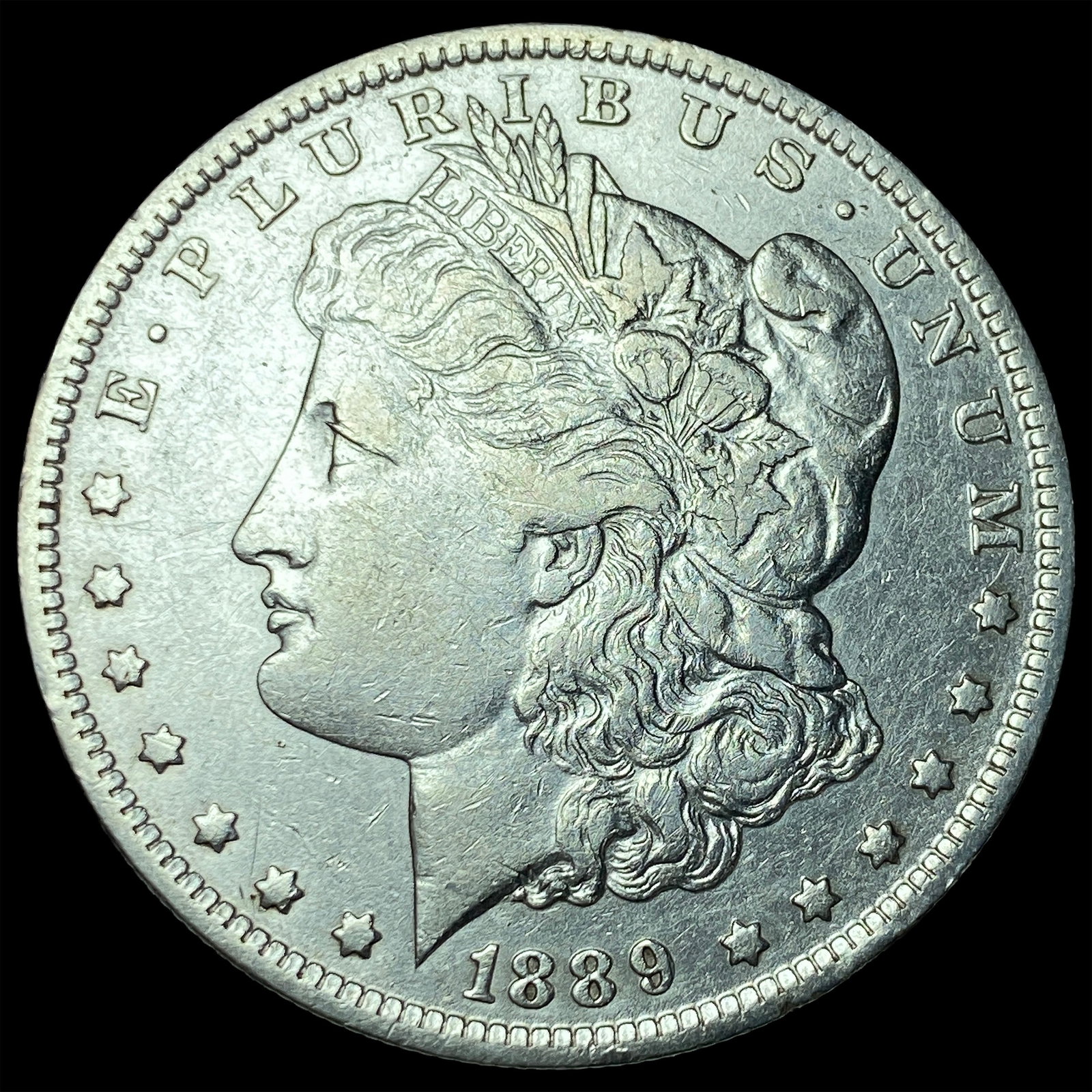 1889-O Morgan Silver Dollar NEARLY UNCIRCULATED: 1889-O Morgan Silver Dollar NEARLY UNCIRCULATED