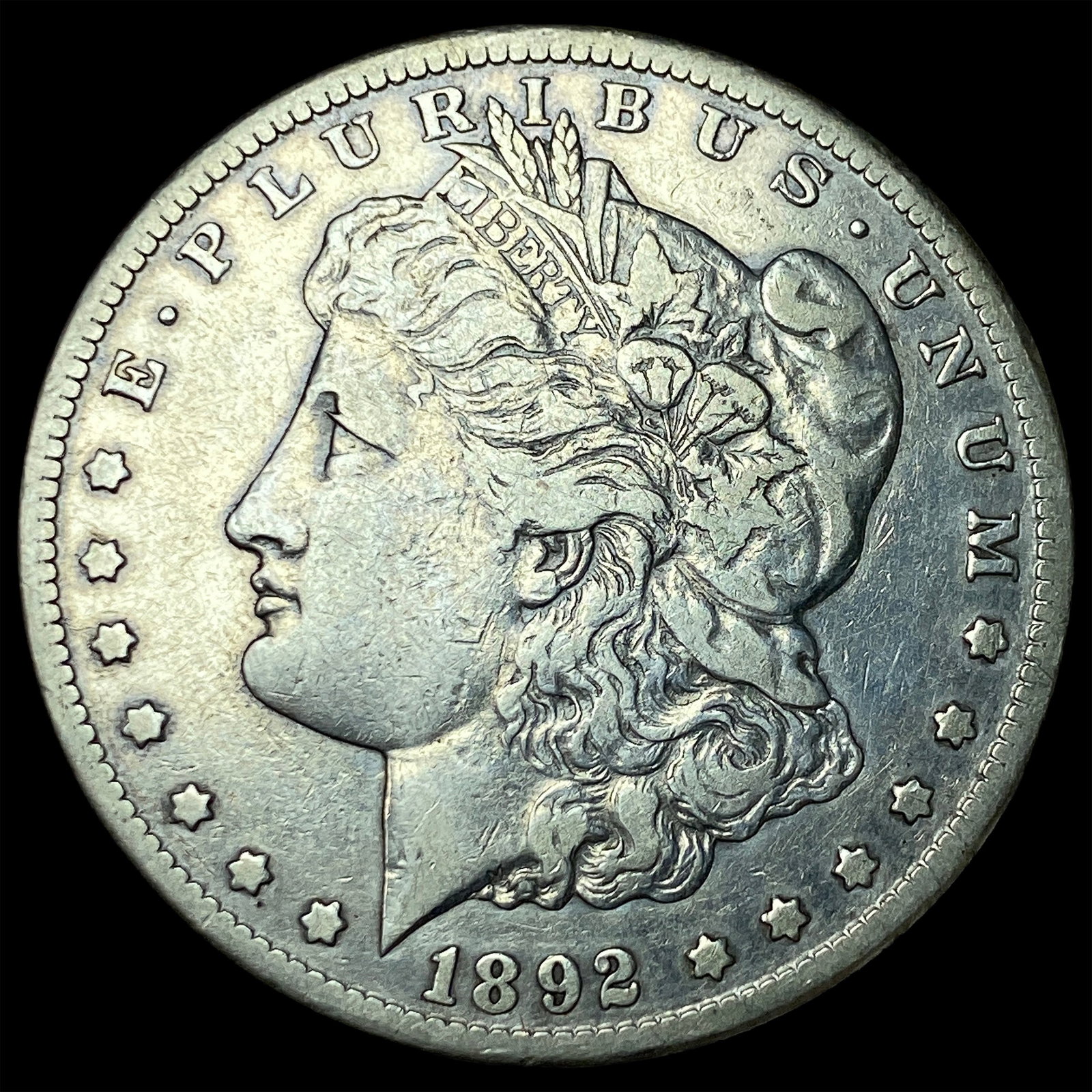 1892-CC Silver Morgan Dollar NEARLY UNCIRCULATED (1 of 2)