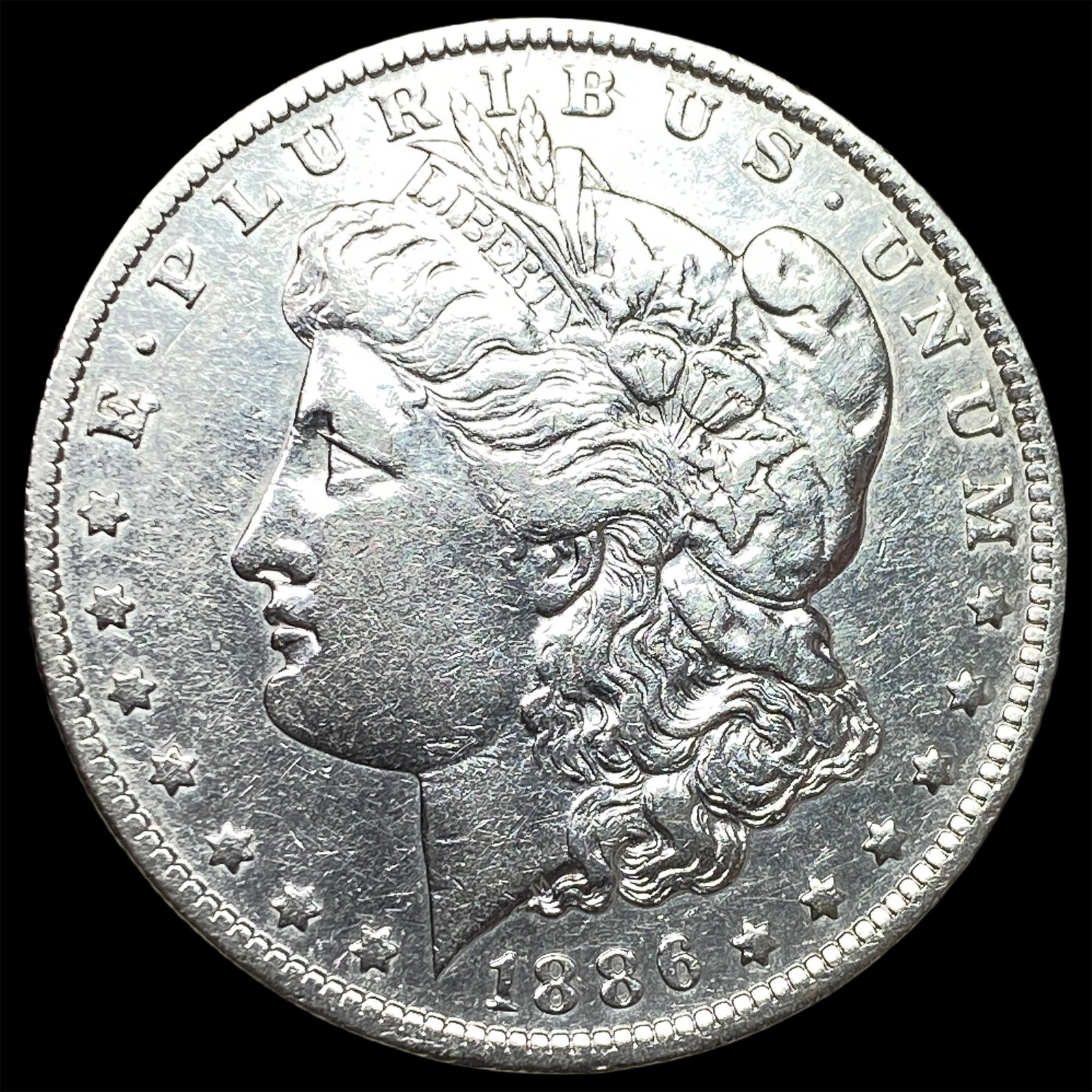 1886-O Silver Morgan Dollar CLOSELY UNCIRCULATED: 1886-O Silver Morgan Dollar CLOSELY UNCIRCULATED