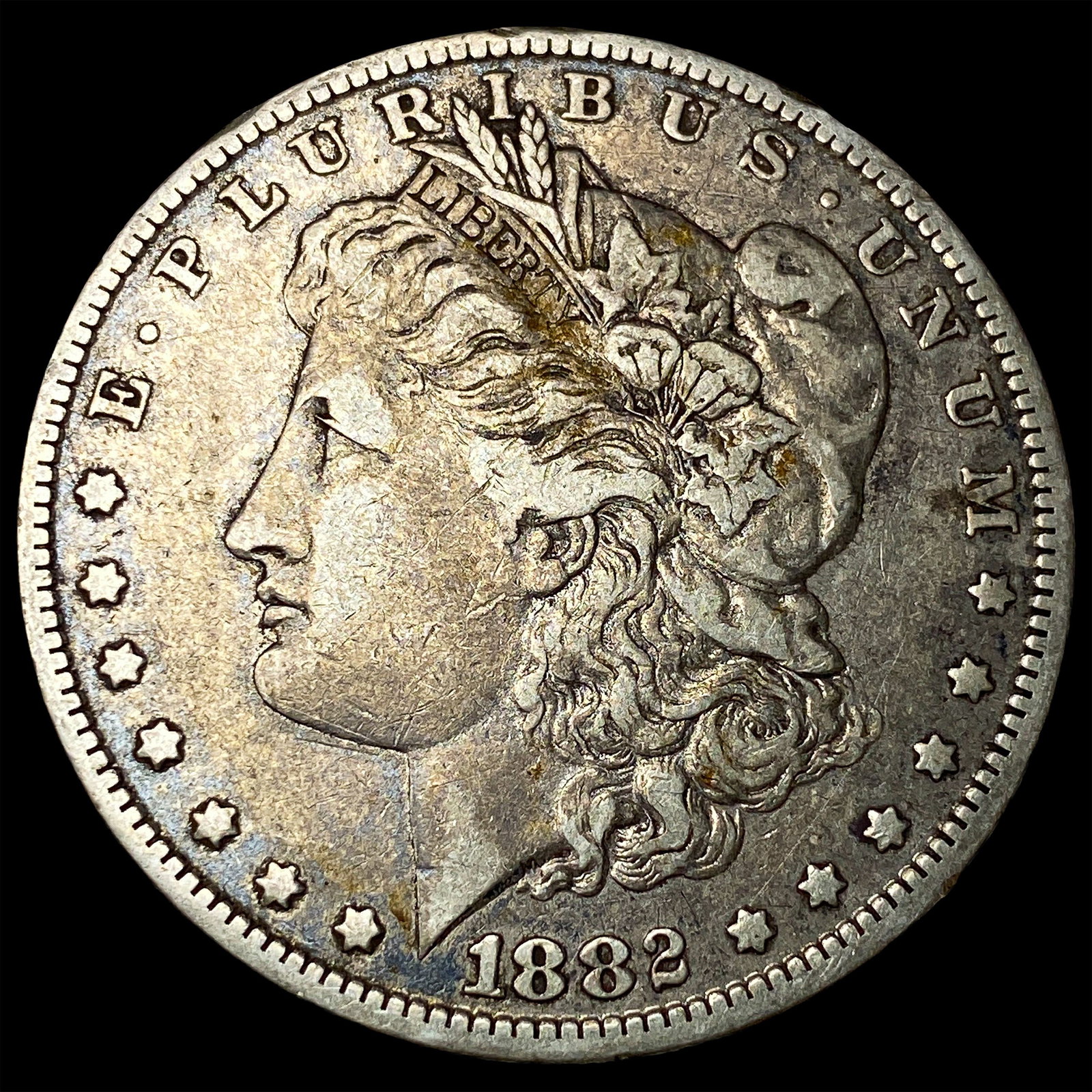 1882-O/S Silver Morgan Dollar ABOUT UNCIRCULATED: 1882-O/S Silver Morgan Dollar ABOUT UNCIRCULATED