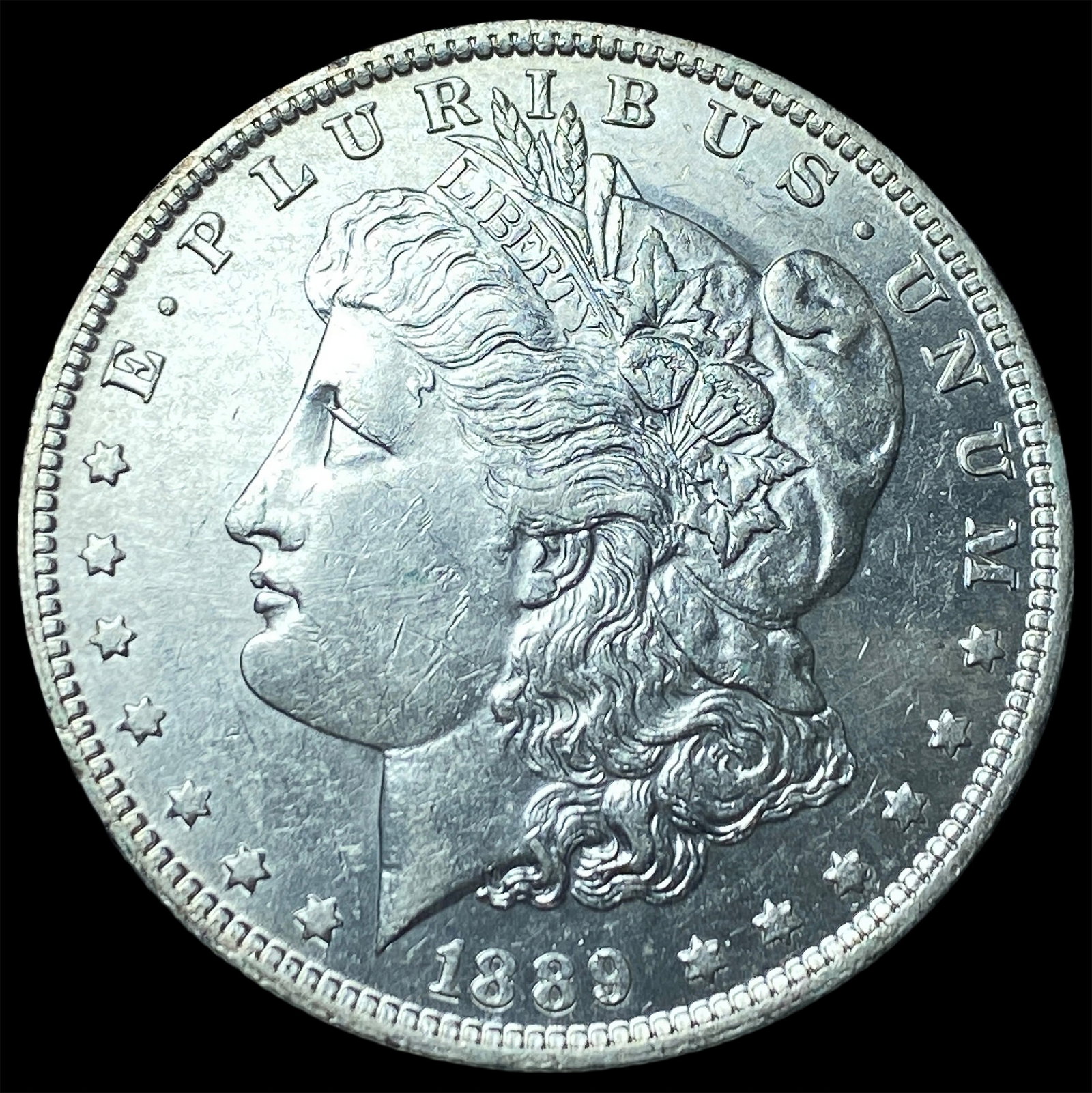 1889-O Morgan Silver Dollar UNCIRCULATED (1 of 2)