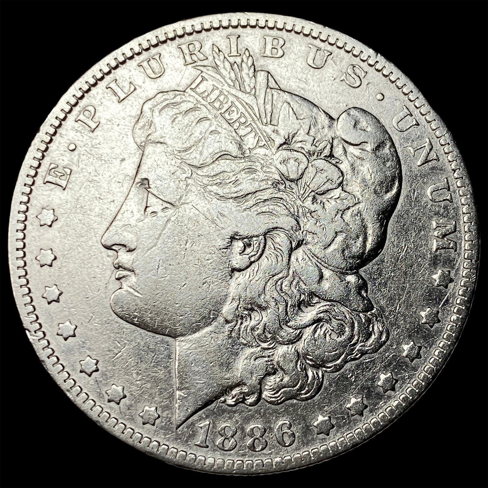 1886-O Morgan Silver Dollar NEARLY UNCIRCULATED: 1886-O Morgan Silver Dollar NEARLY UNCIRCULATED