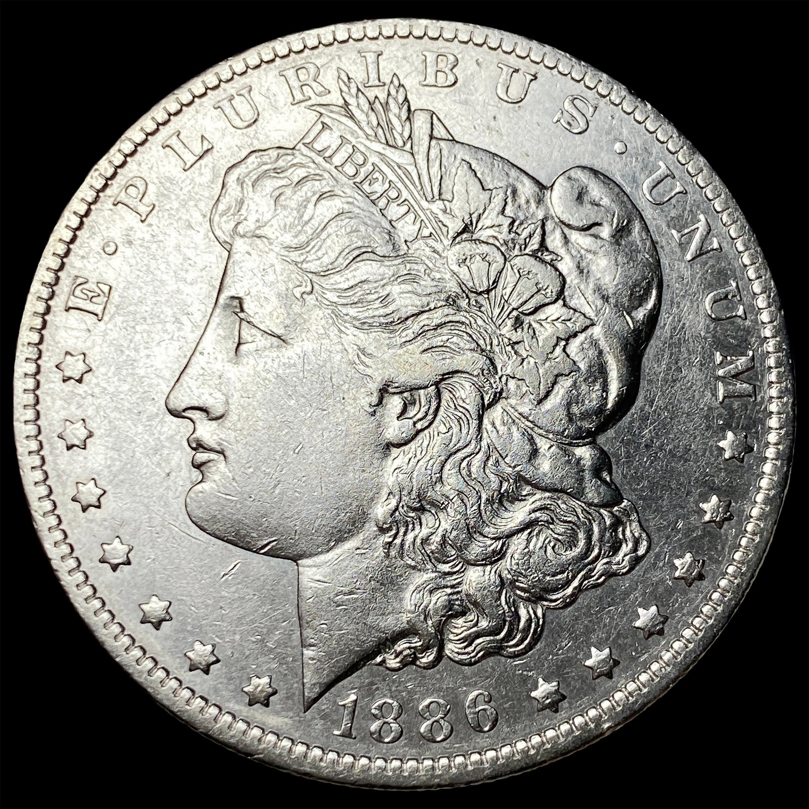 1886-O Silver Morgan Dollar CLOSELY UNCIRCULATED: 1886-O Silver Morgan Dollar CLOSELY UNCIRCULATED