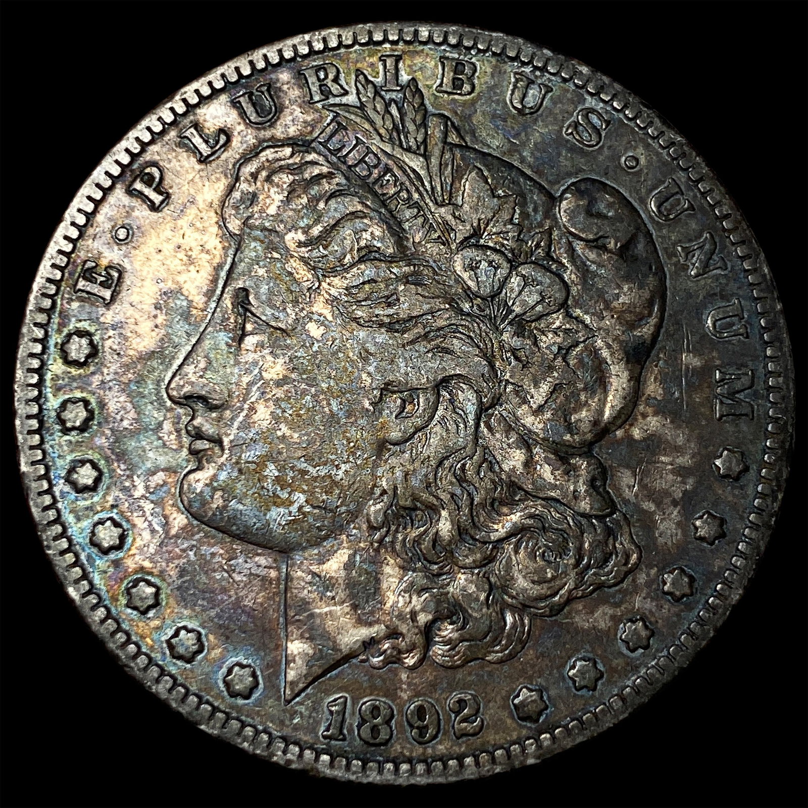 1892-S Silver Morgan Dollar NEARLY UNCIRCULATED (1 of 2)