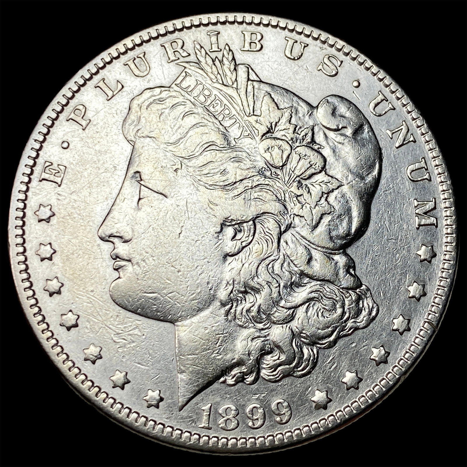 1899 Silver Morgan Dollar CLOSELY UNCIRCULATED: 1899 Silver Morgan Dollar CLOSELY UNCIRCULATED