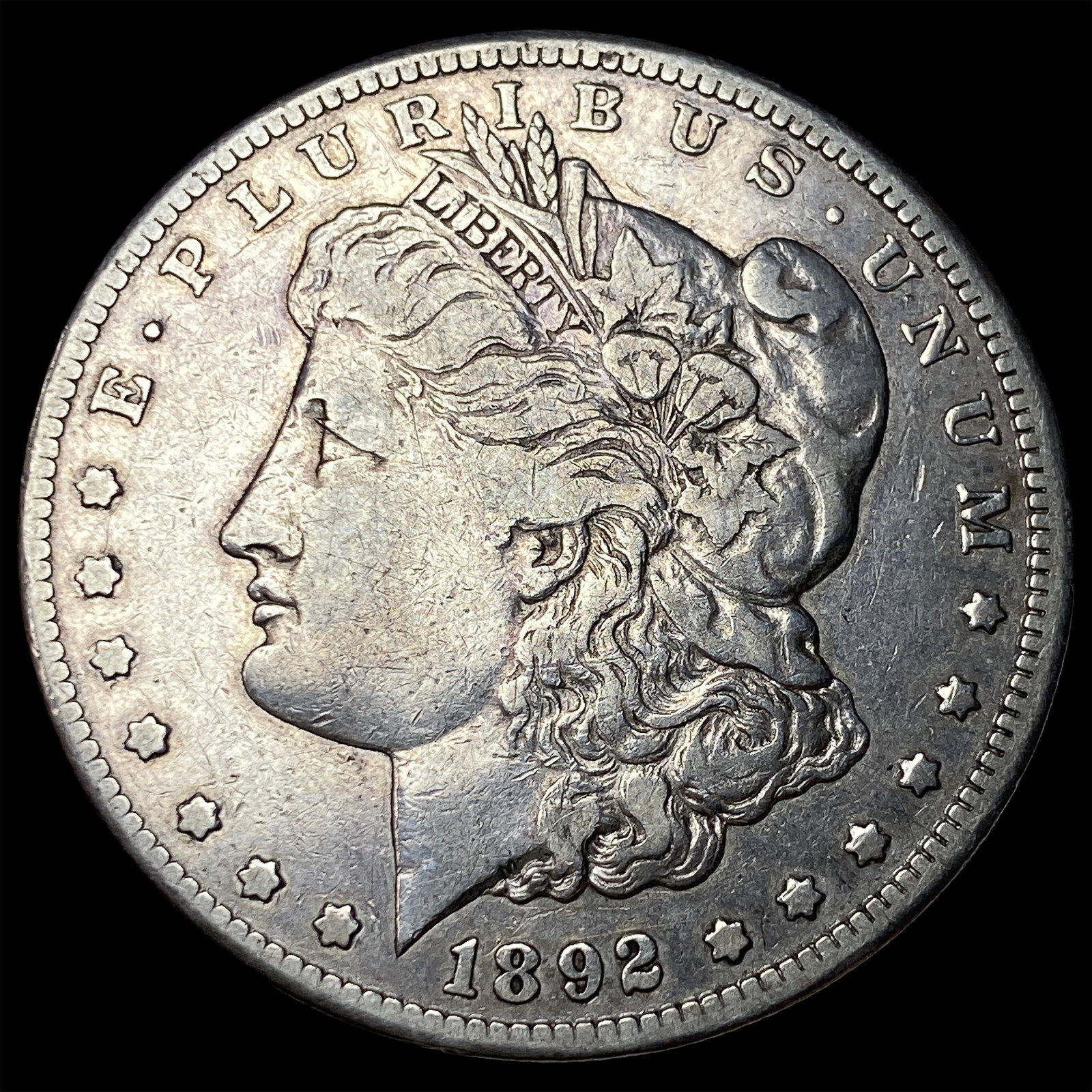 1892-CC Silver Morgan Dollar NEARLY UNCIRCULATED (1 of 2)