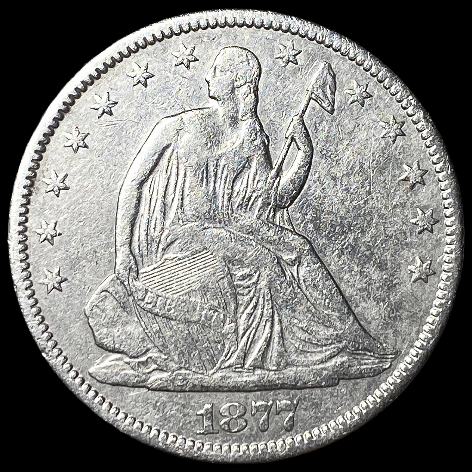 1877-CC Silver Half Dollar CLOSELY UNCIRCULATED: 1877-CC Silver Half Dollar CLOSELY UNCIRCULATED