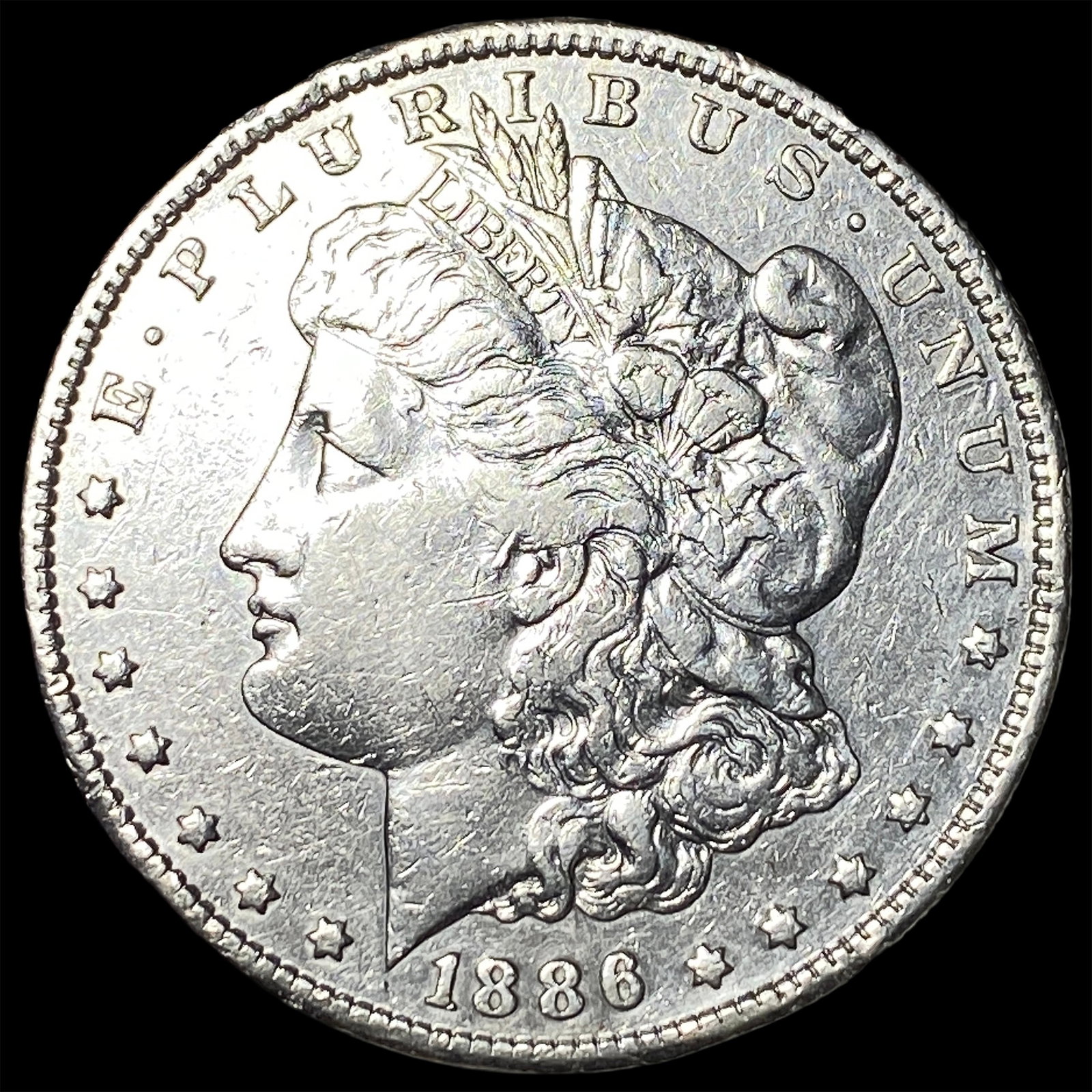 1886 Silver Morgan Dollar CLOSELY UNCIRCULATED: 1886 Silver Morgan Dollar CLOSELY UNCIRCULATED