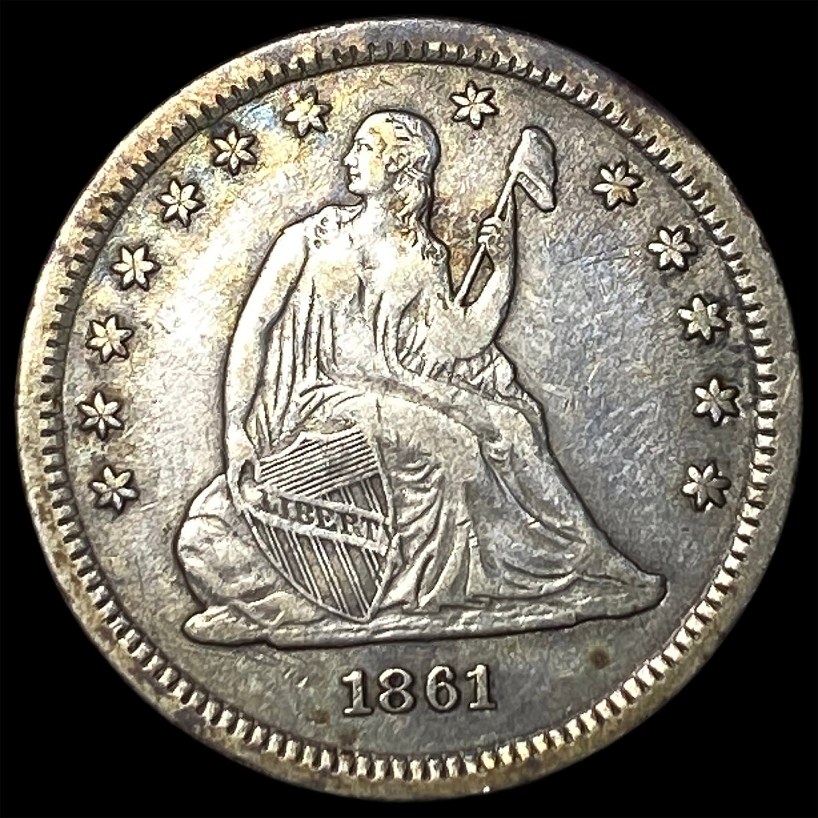 1861 Seated Liberty Quarter UNCIRCULATED (1 of 2)