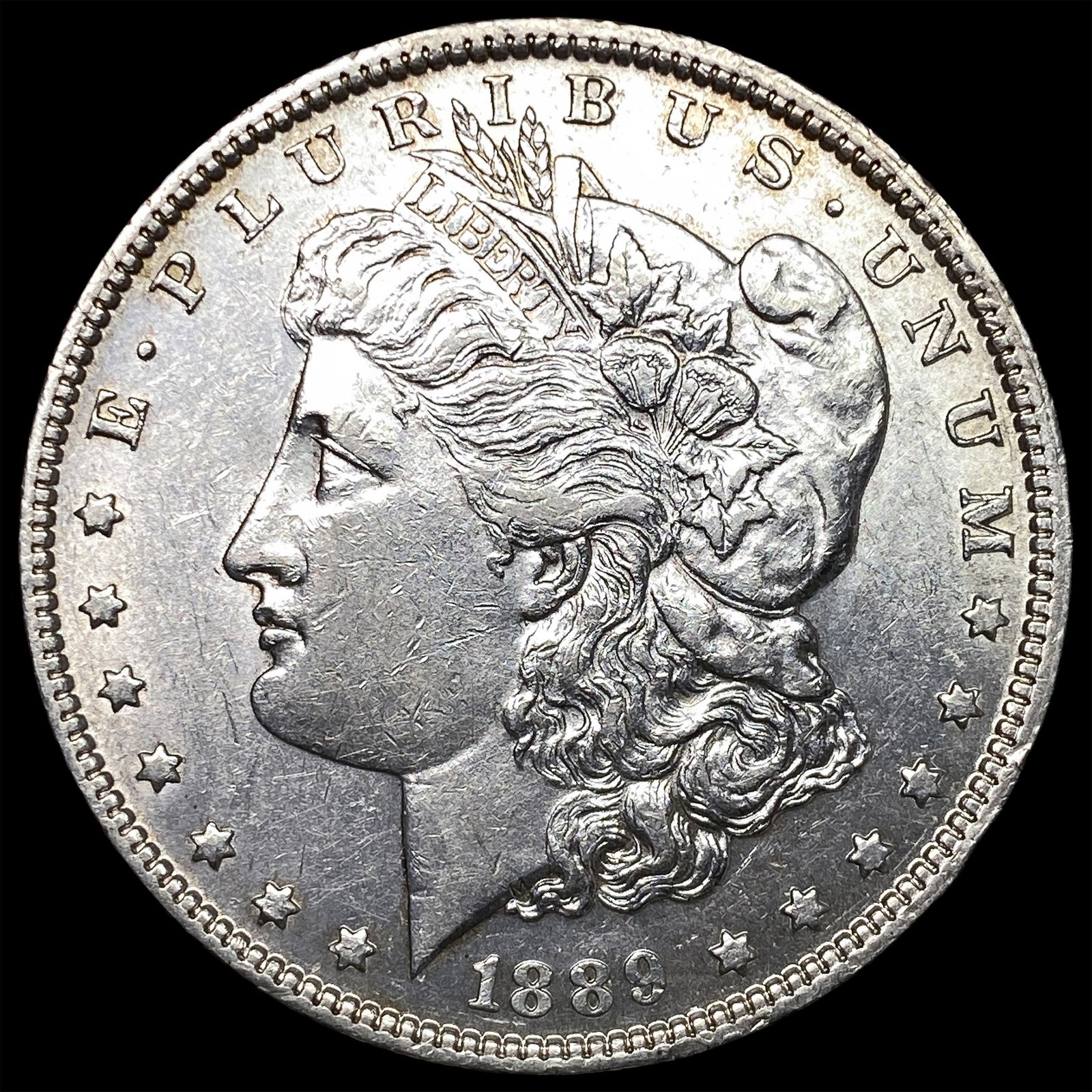 1889-O Morgan Silver Dollar CLOSELY UNCIRCULATED: 1889-O Morgan Silver Dollar CLOSELY UNCIRCULATED