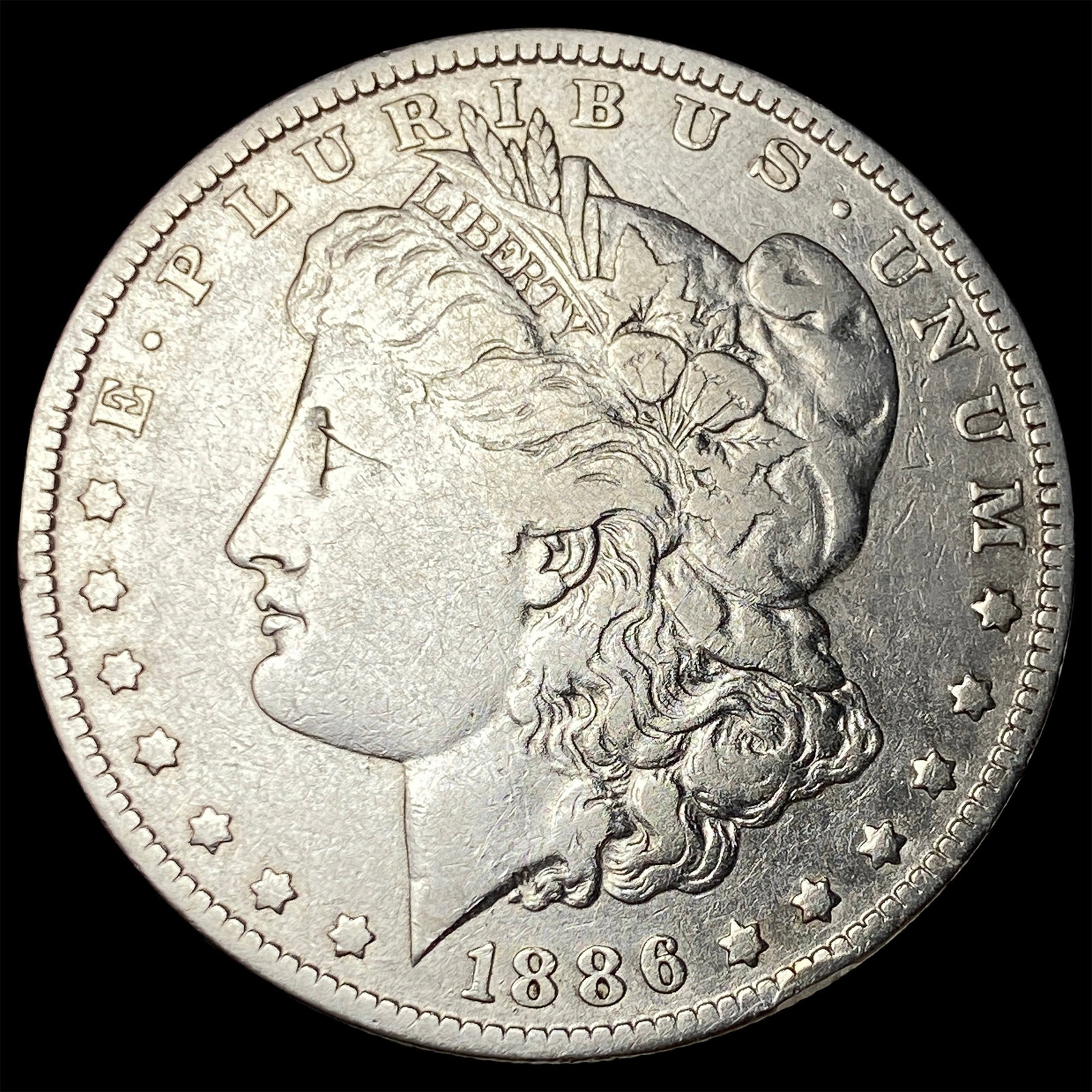 1886-O Silver Morgan Dollar ABOUT UNCIRCULATED (1 of 2)