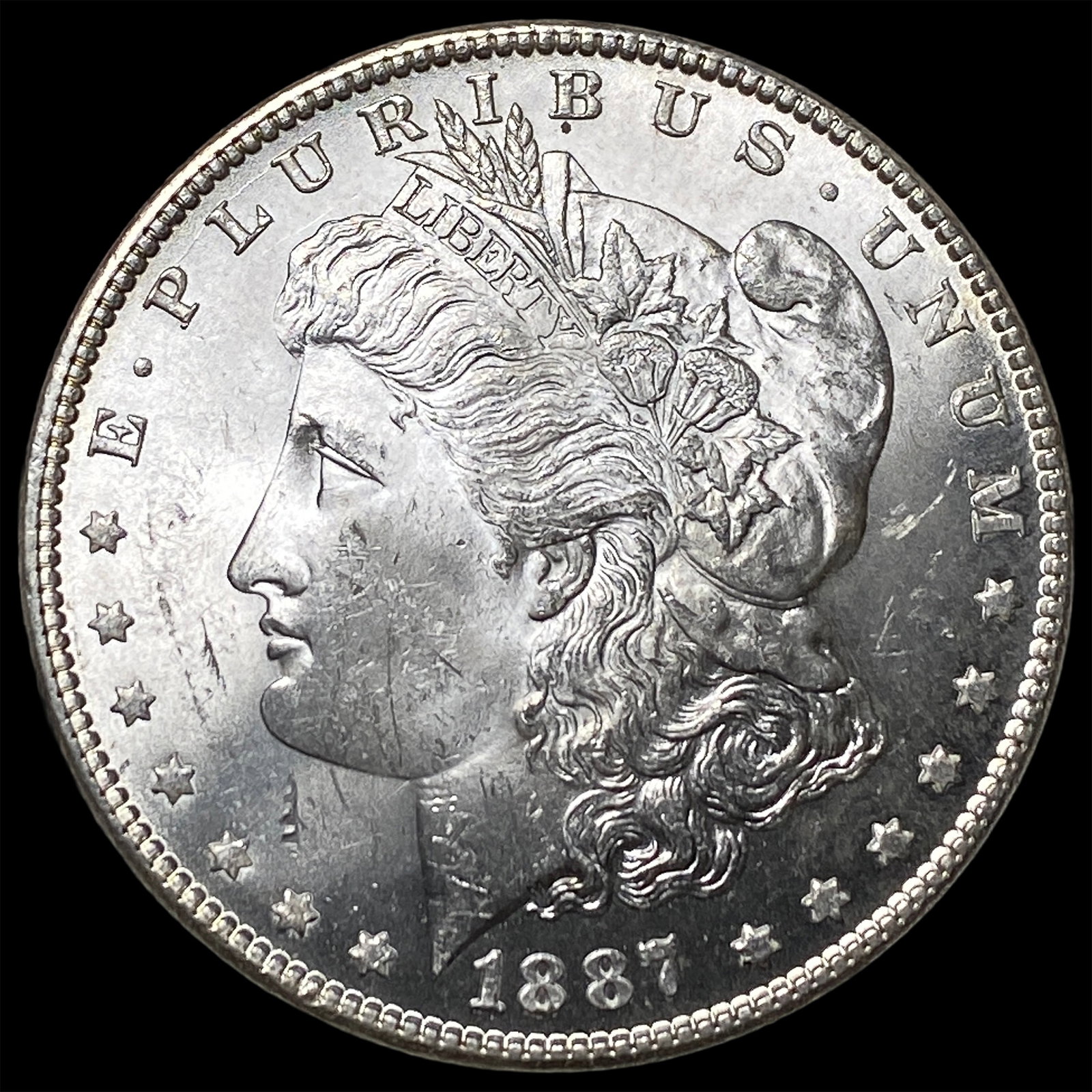 1887 Morgan Silver Dollar NEARLY UNCIRCULATED: 1887 Morgan Silver Dollar NEARLY UNCIRCULATED