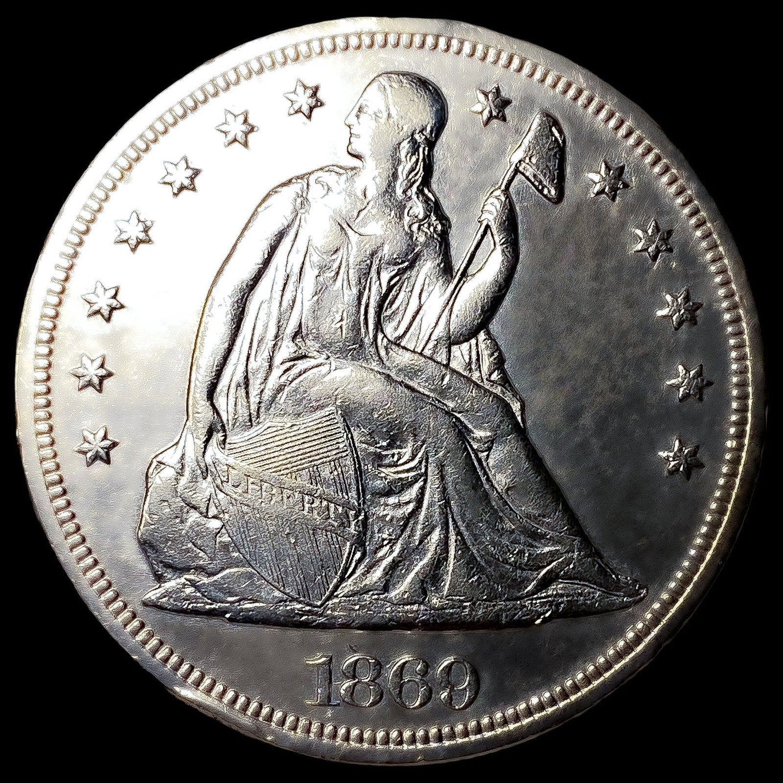 1869 Seated Liberty Dollar (1 of 2)