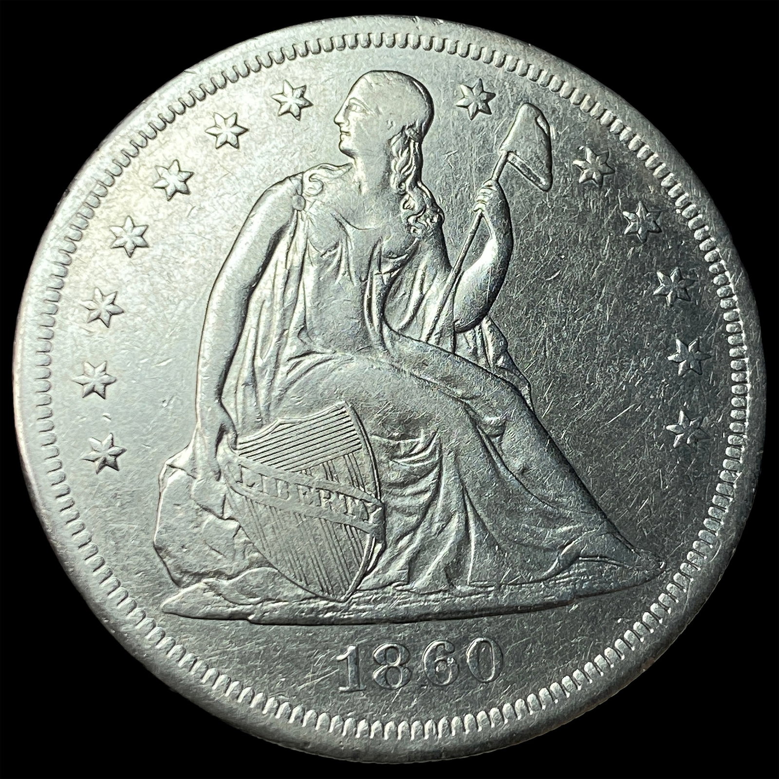 1860-O Silver Seated Liberty Dollar CLOSELY UNCIRCULATED: 1860-O Silver Seated Liberty Dollar CLOSELY UNCIRCULATED