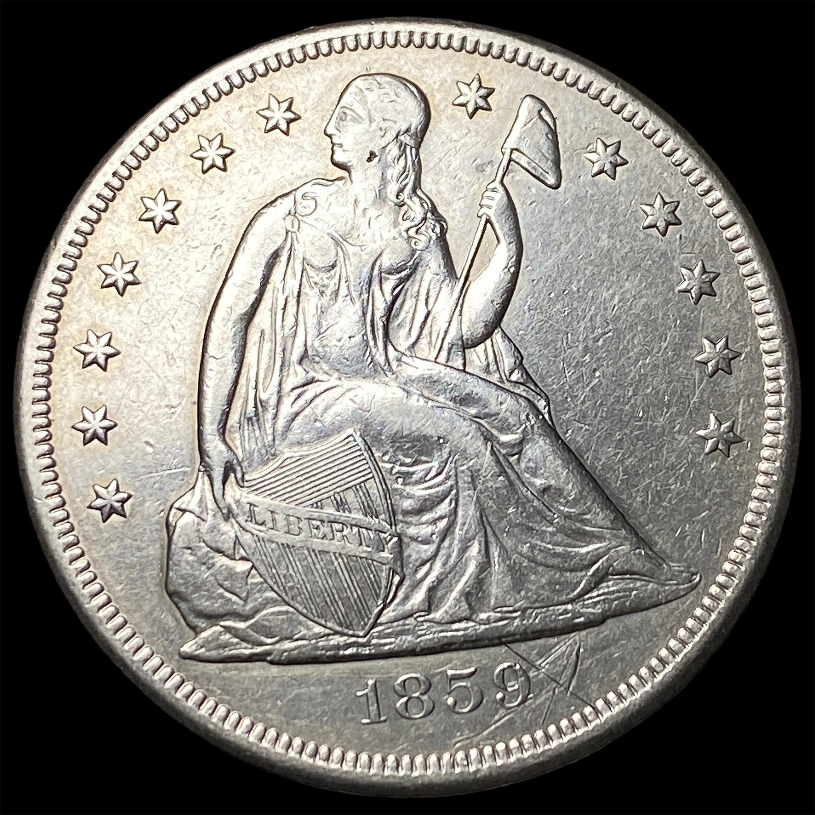 1859-O Silver Seated Liberty Dollar CLOSELY UNCIRCULATED: 1859-O Silver Seated Liberty Dollar CLOSELY UNCIRCULATED