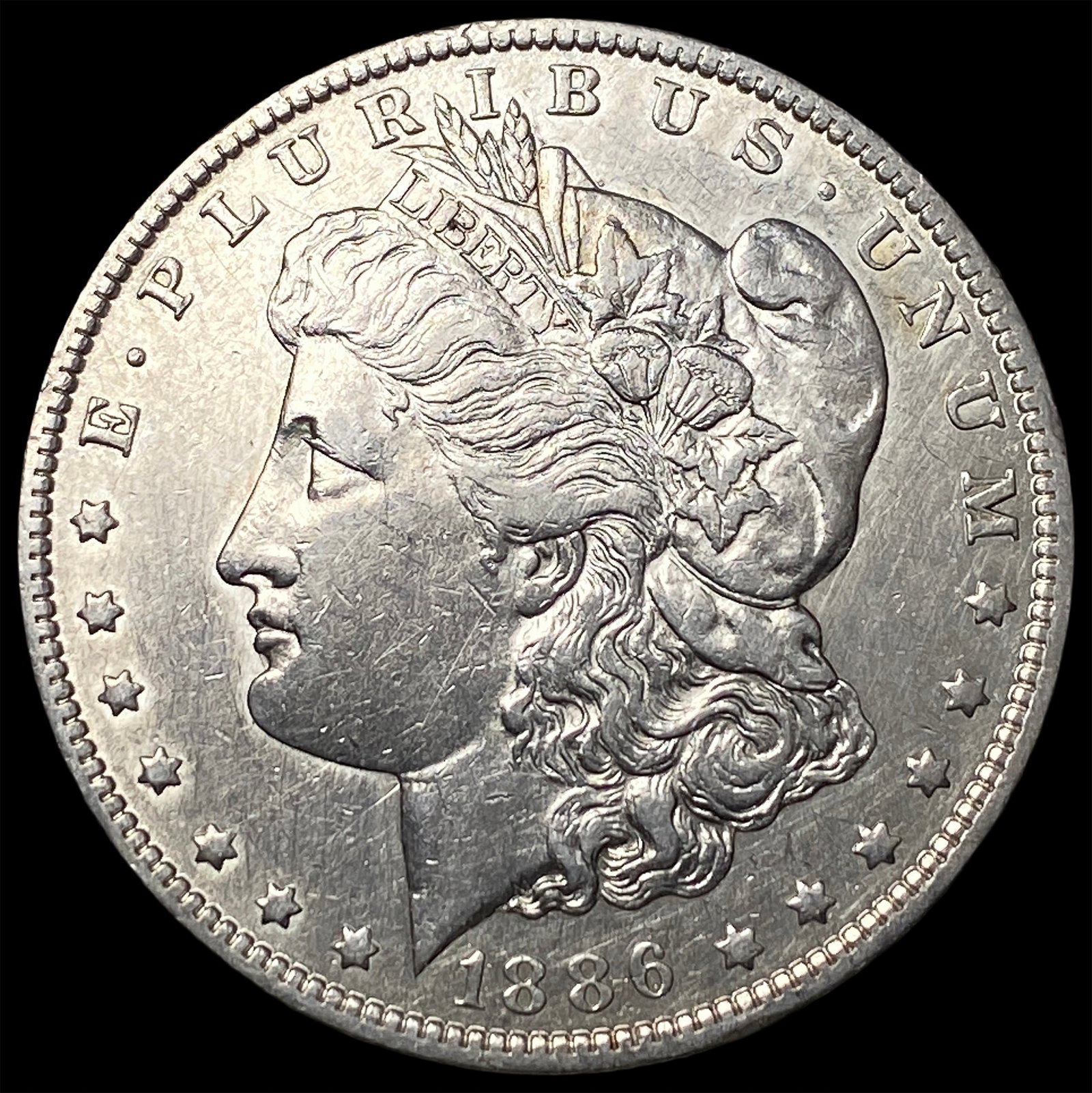 1886-O Silver Morgan Dollar CLOSELY UNCIRCULATED: 1886-O Silver Morgan Dollar CLOSELY UNCIRCULATED