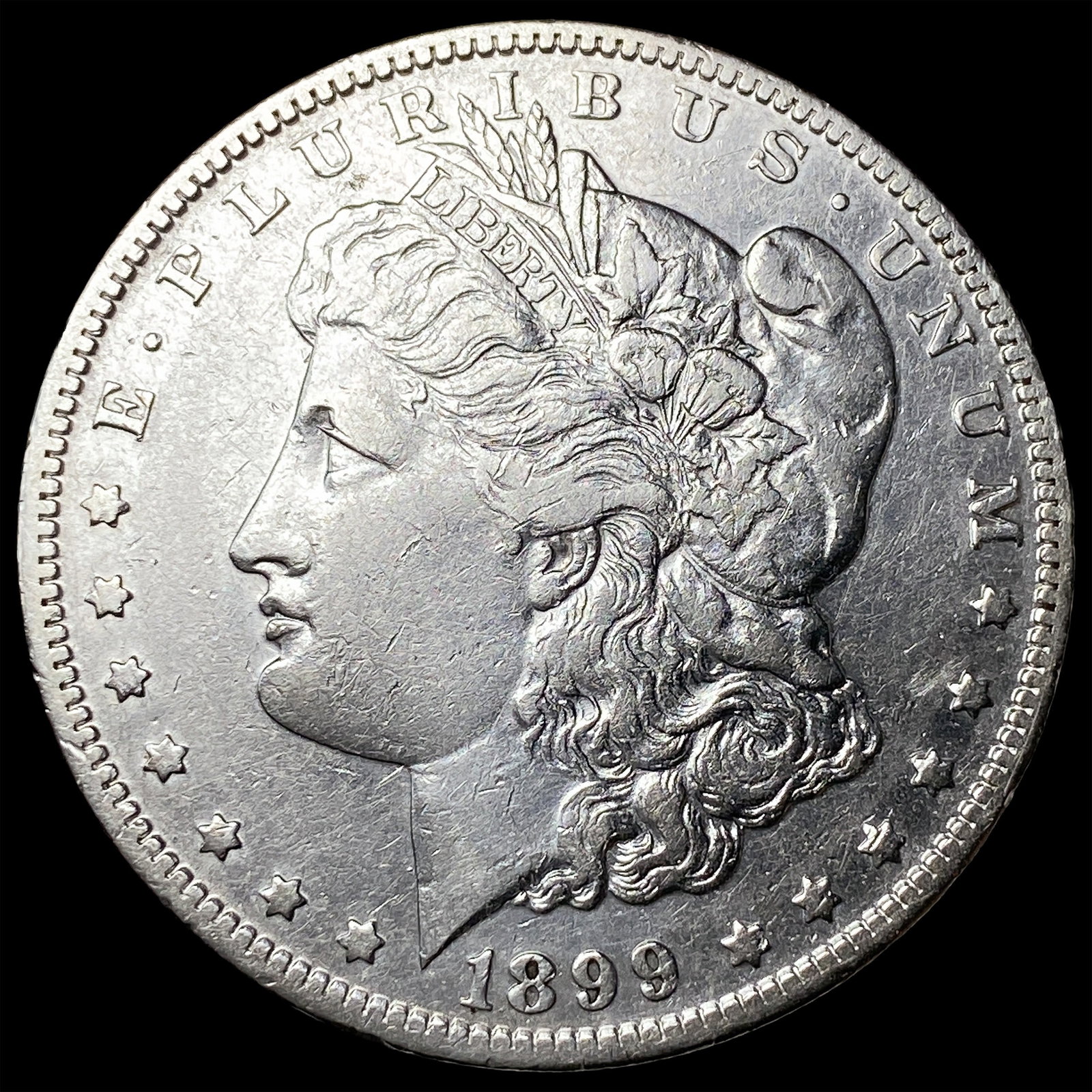 1899-O Micro O Silver Morgan Dollar NEARLY UNCIRCULATED: 1899-O Micro O Silver Morgan Dollar NEARLY UNCIRCULATED