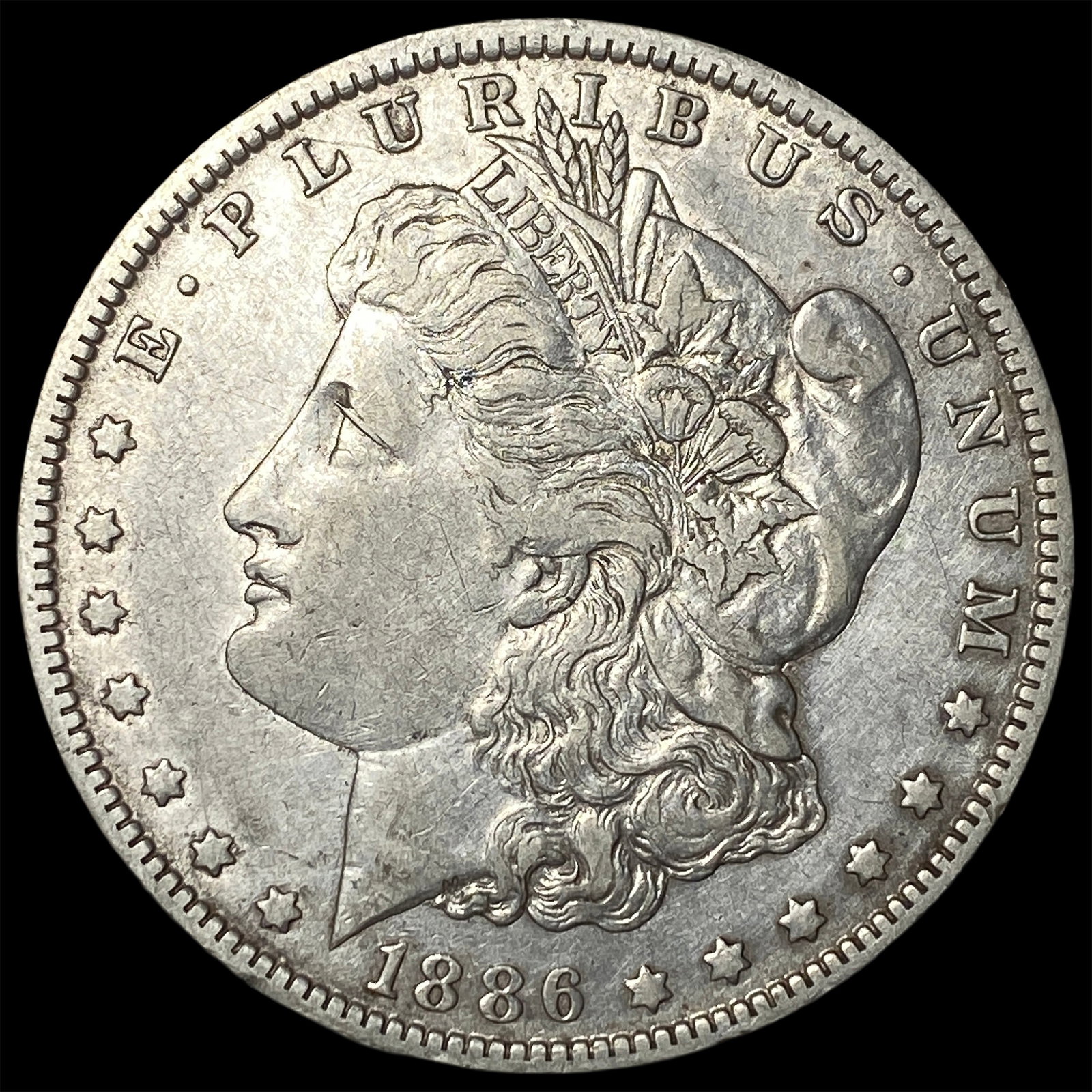 1886-O Silver Morgan Dollar NEARLY UNCIRCULATED: 1886-O Silver Morgan Dollar NEARLY UNCIRCULATED