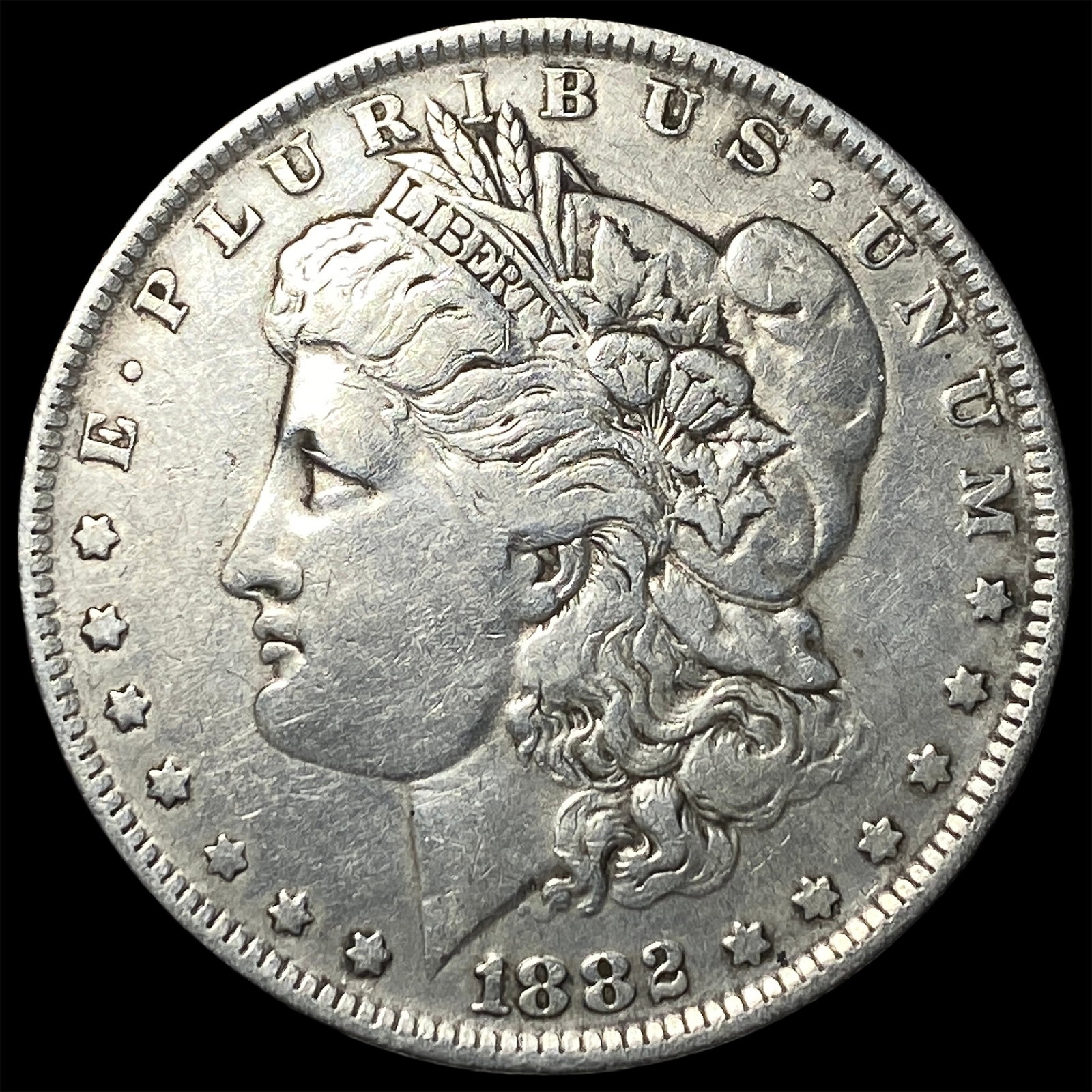 1882-O Silver Morgan Dollar ABOUT UNCIRCULATED: 1882-O Silver Morgan Dollar ABOUT UNCIRCULATED
