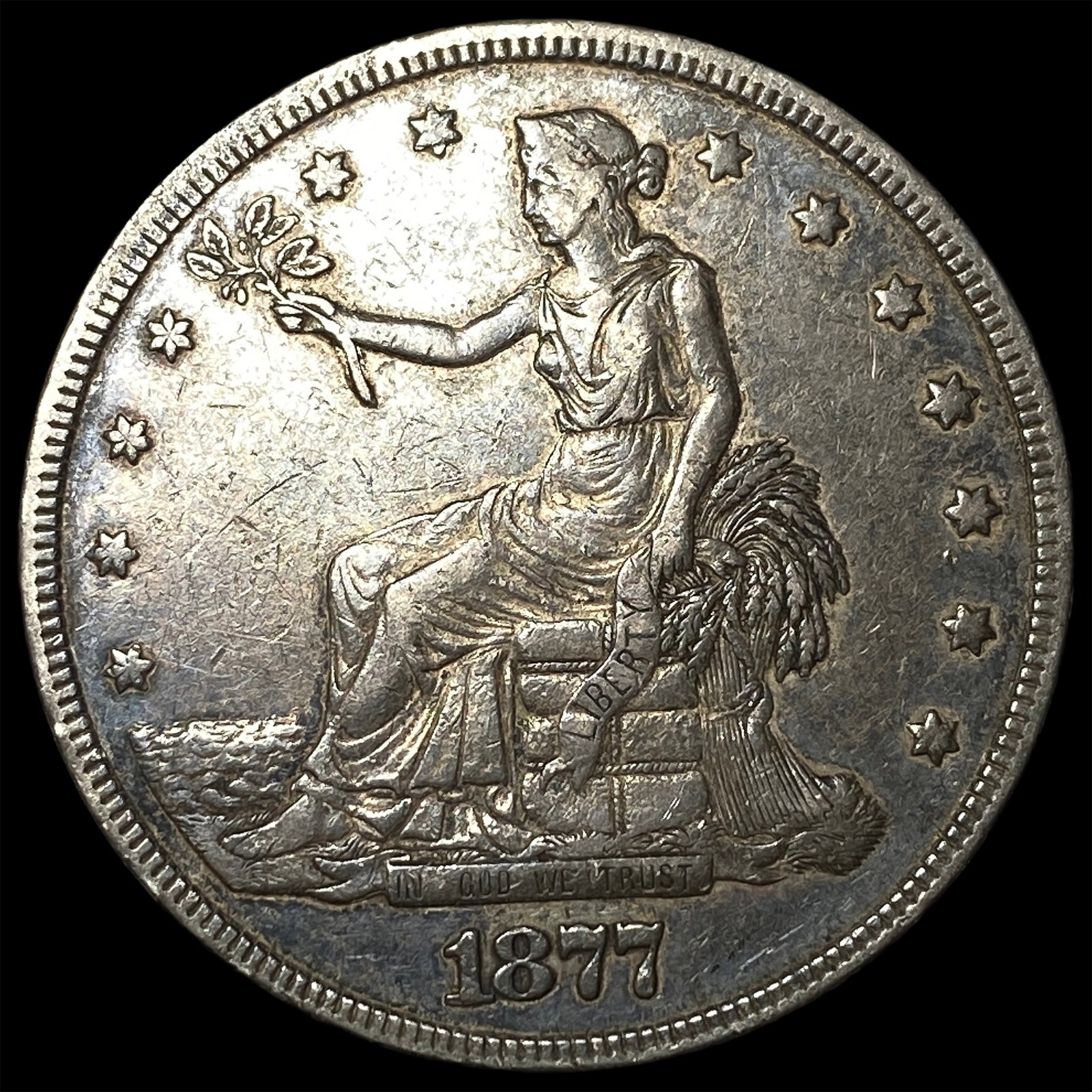 1877 Silver Trade Dollar NEARLY UNCIRCULATED (1 of 2)