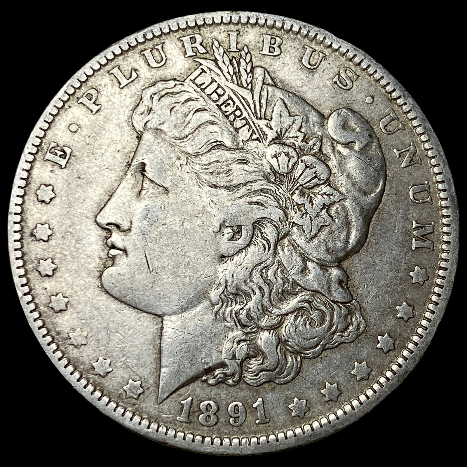 1891-O Silver Morgan Dollar NEARLY UNCIRCULATED (1 of 2)