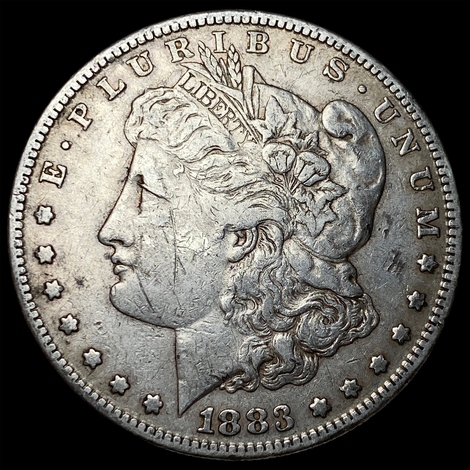 1883-CC Silver Morgan Dollar CLOSELY UNCIRCULATED (1 of 2)