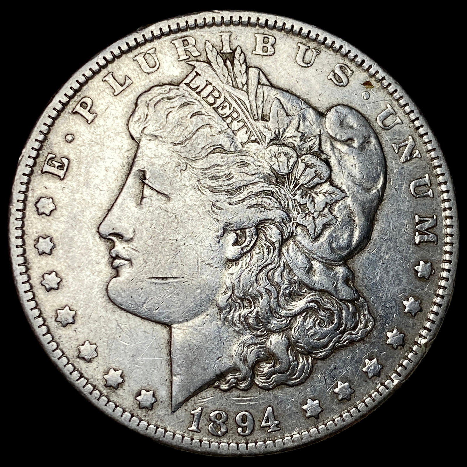 1894-O Silver Morgan Dollar NEARLY UNCIRCULATED (1 of 2)