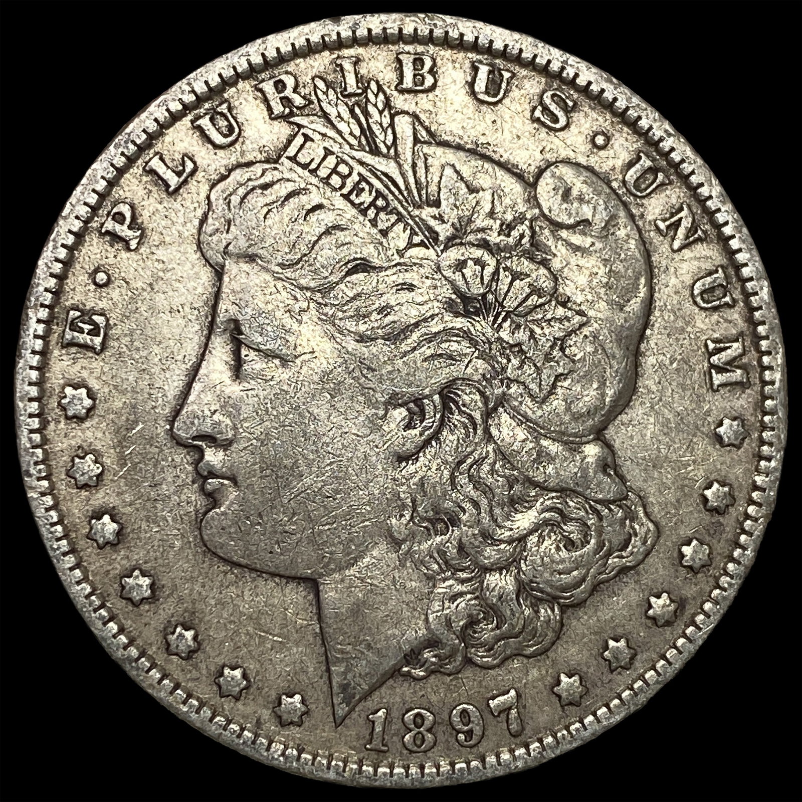 1897-O Silver Morgan Dollar CLOSELY UNCIRCULATED: 1897-O Silver Morgan Dollar CLOSELY UNCIRCULATED