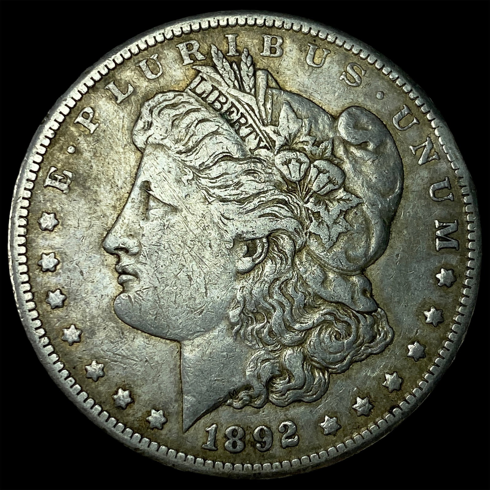 1892-CC Silver Morgan Dollar NEARLY UNCIRCULATED (1 of 2)