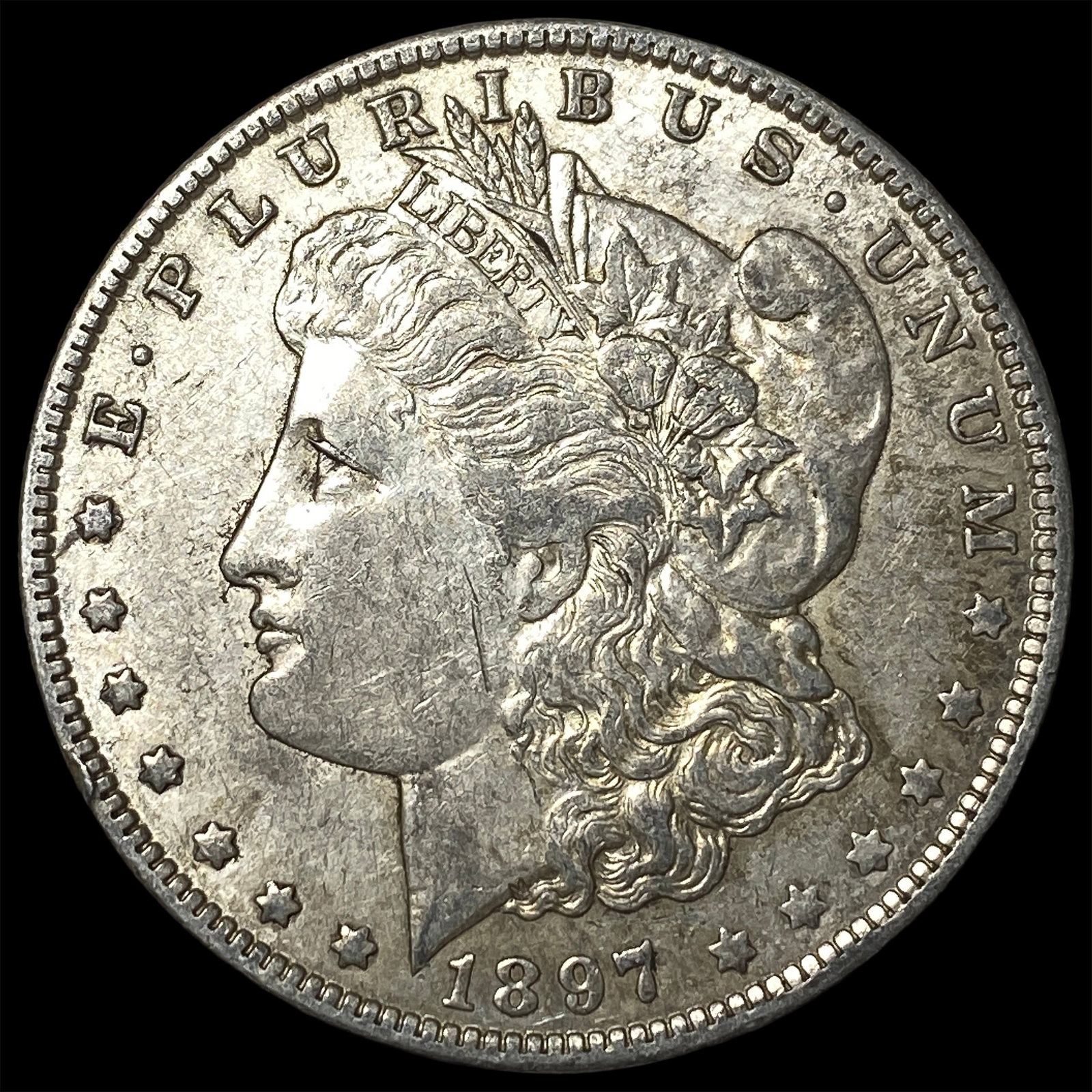 1897-O Silver Morgan Dollar CLOSELY UNCIRCULATED: 1897-O Silver Morgan Dollar CLOSELY UNCIRCULATED