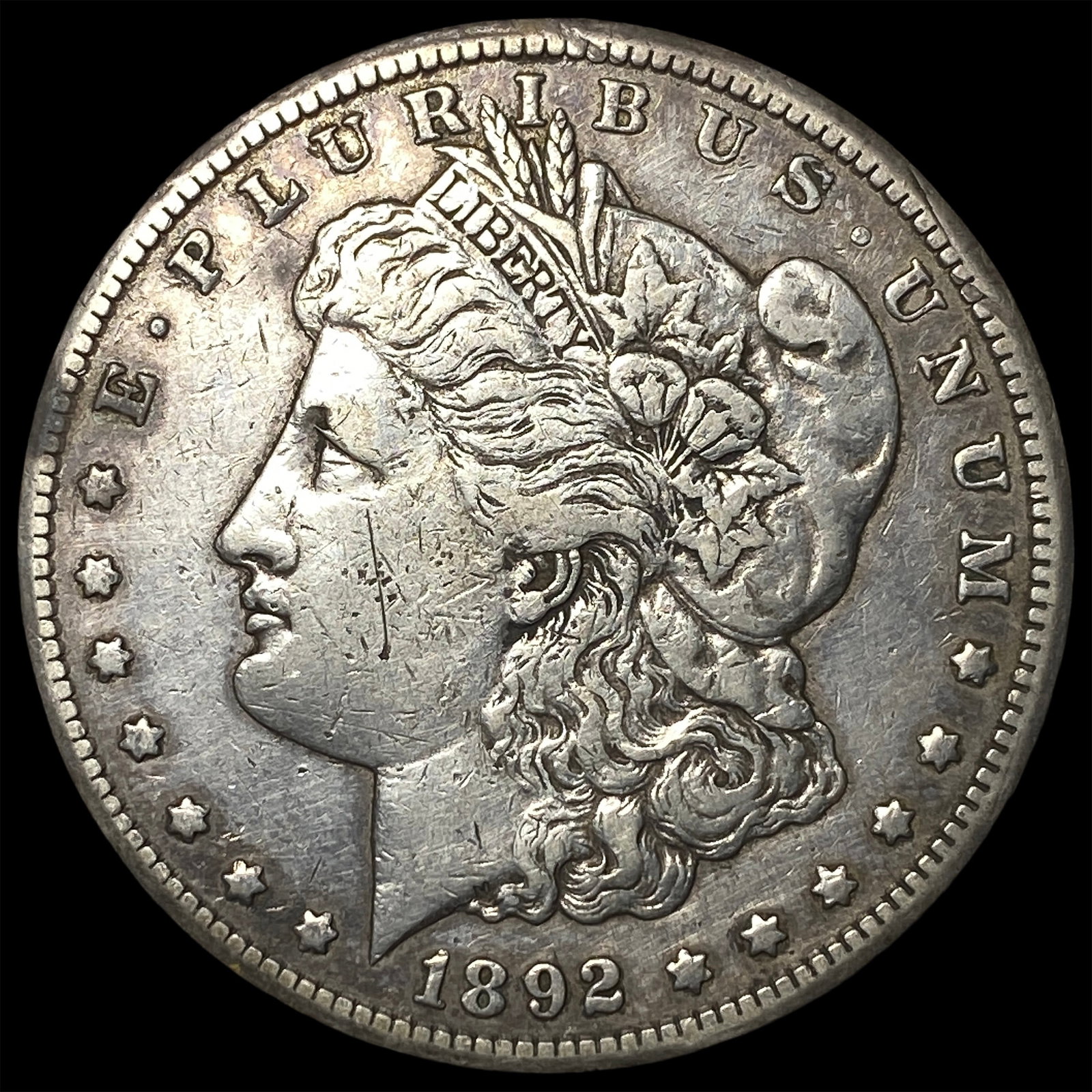 1892-CC Silver Morgan Dollar CLOSELY UNCIRCULATED: 1892-CC Silver Morgan Dollar CLOSELY UNCIRCULATED