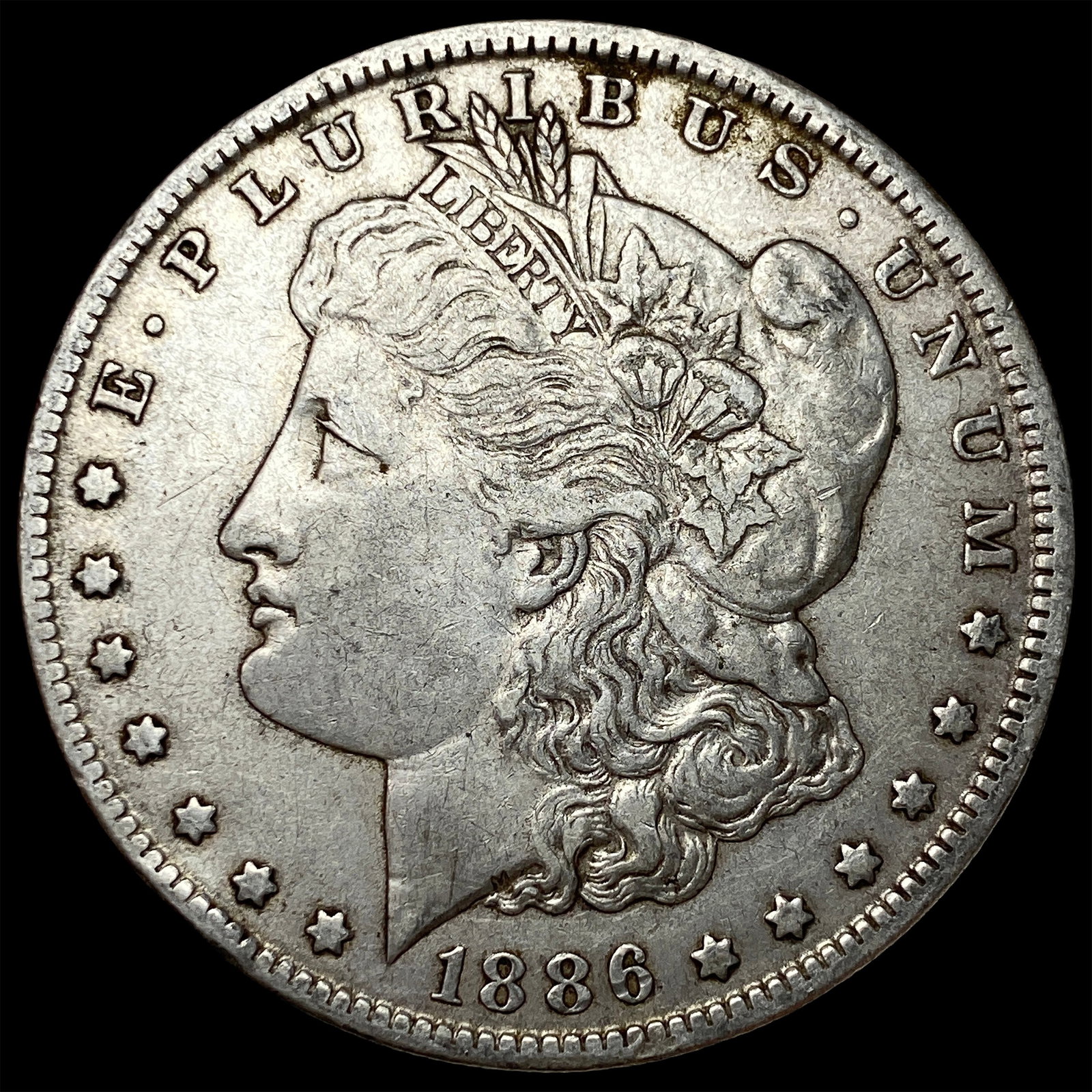 1886-O Silver Morgan Dollar NEARLY UNCIRCULATED: 1886-O Silver Morgan Dollar NEARLY UNCIRCULATED