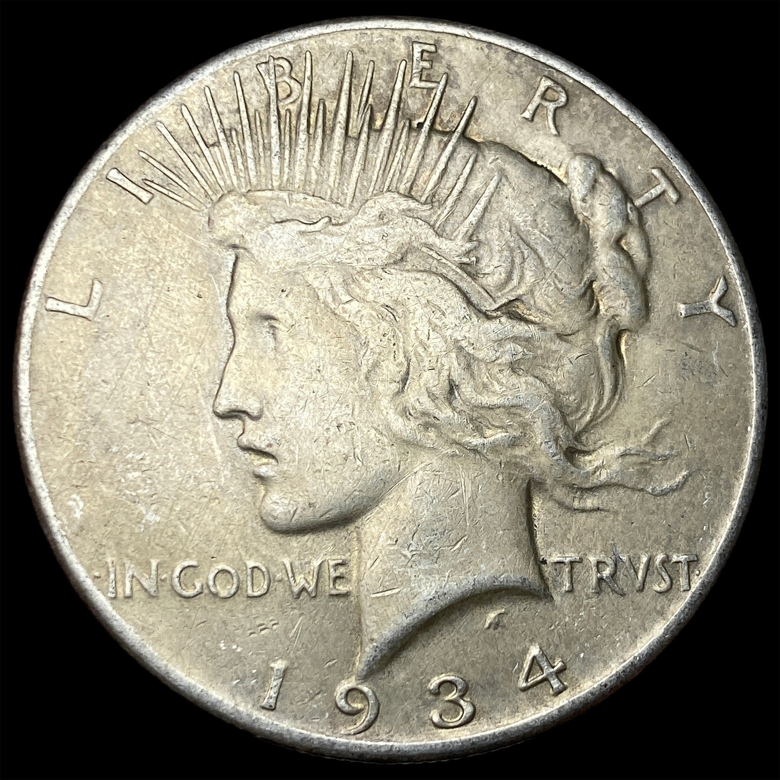 1934 Peace Silver Dollar CLOSELY UNCIRCULATED (1 of 2)