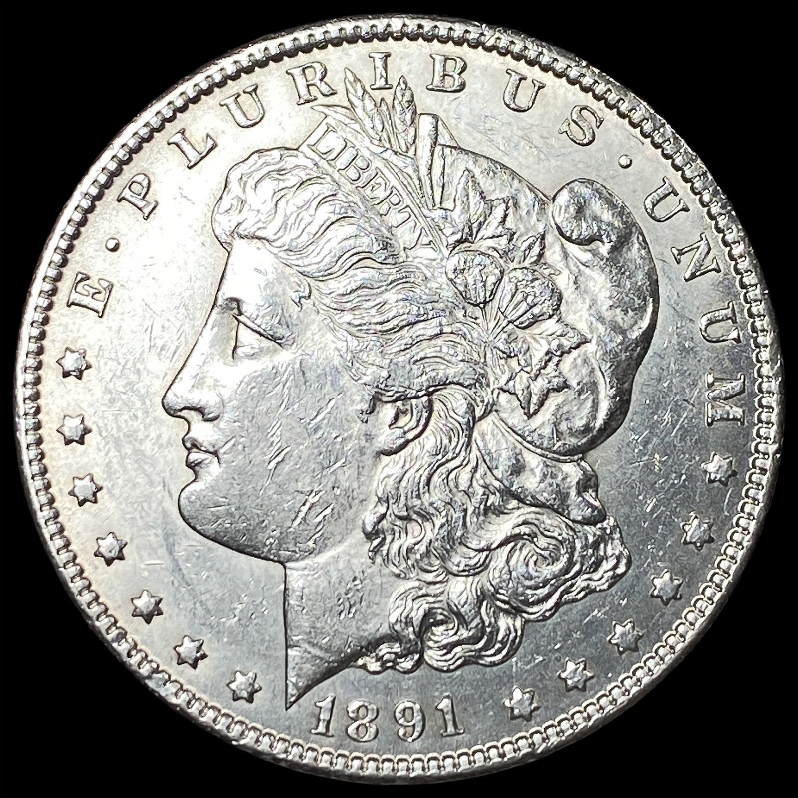 1891-CC Silver Morgan Dollar NEARLY UNCIRCULATED (1 of 2)